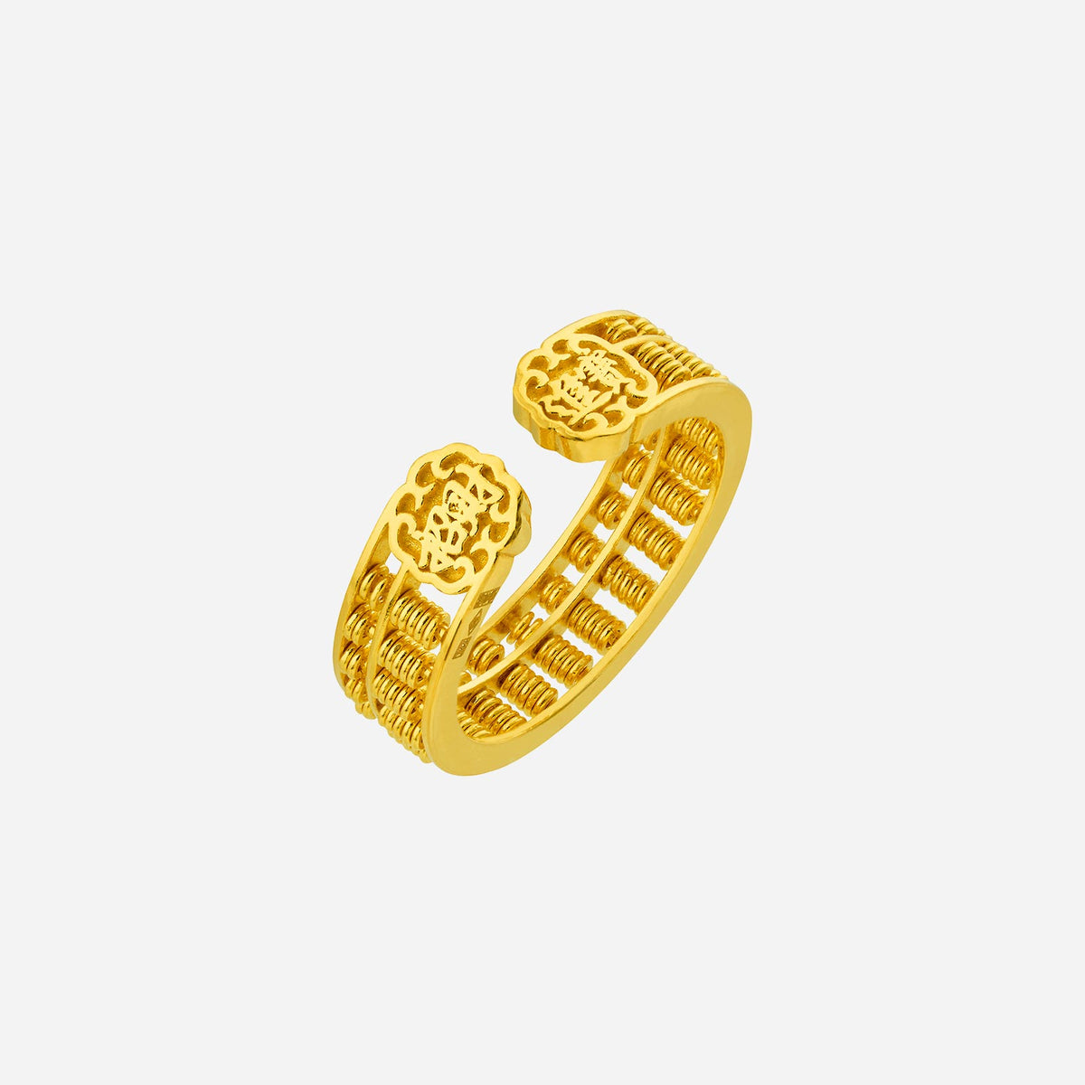 elegant abacus ring in 22k yellow gold featuring intricate cut-out designs and a unique woven band.