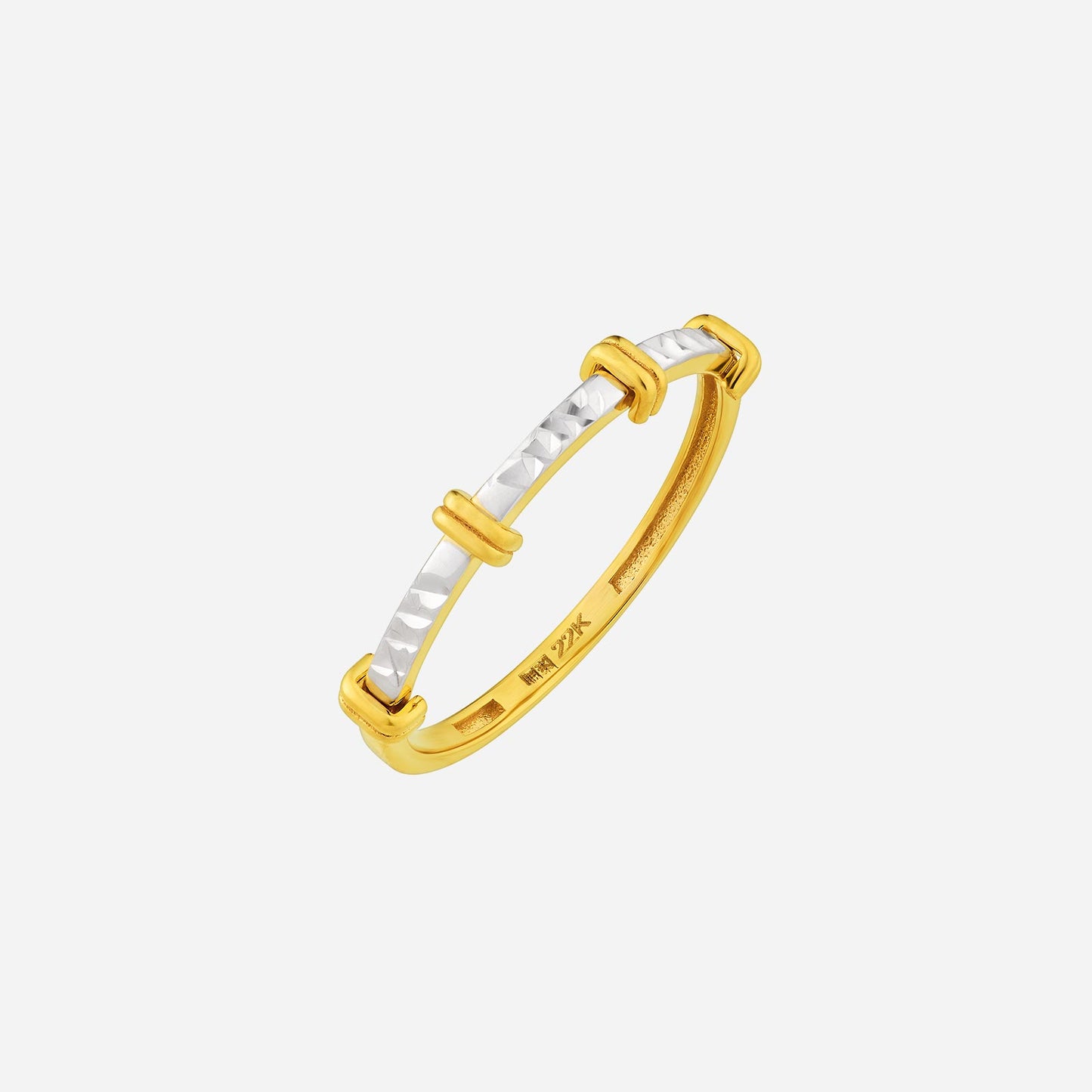 sparkling ring in 22k yellow and white gold with a sleek white gold face and dynamic yellow gold loops.