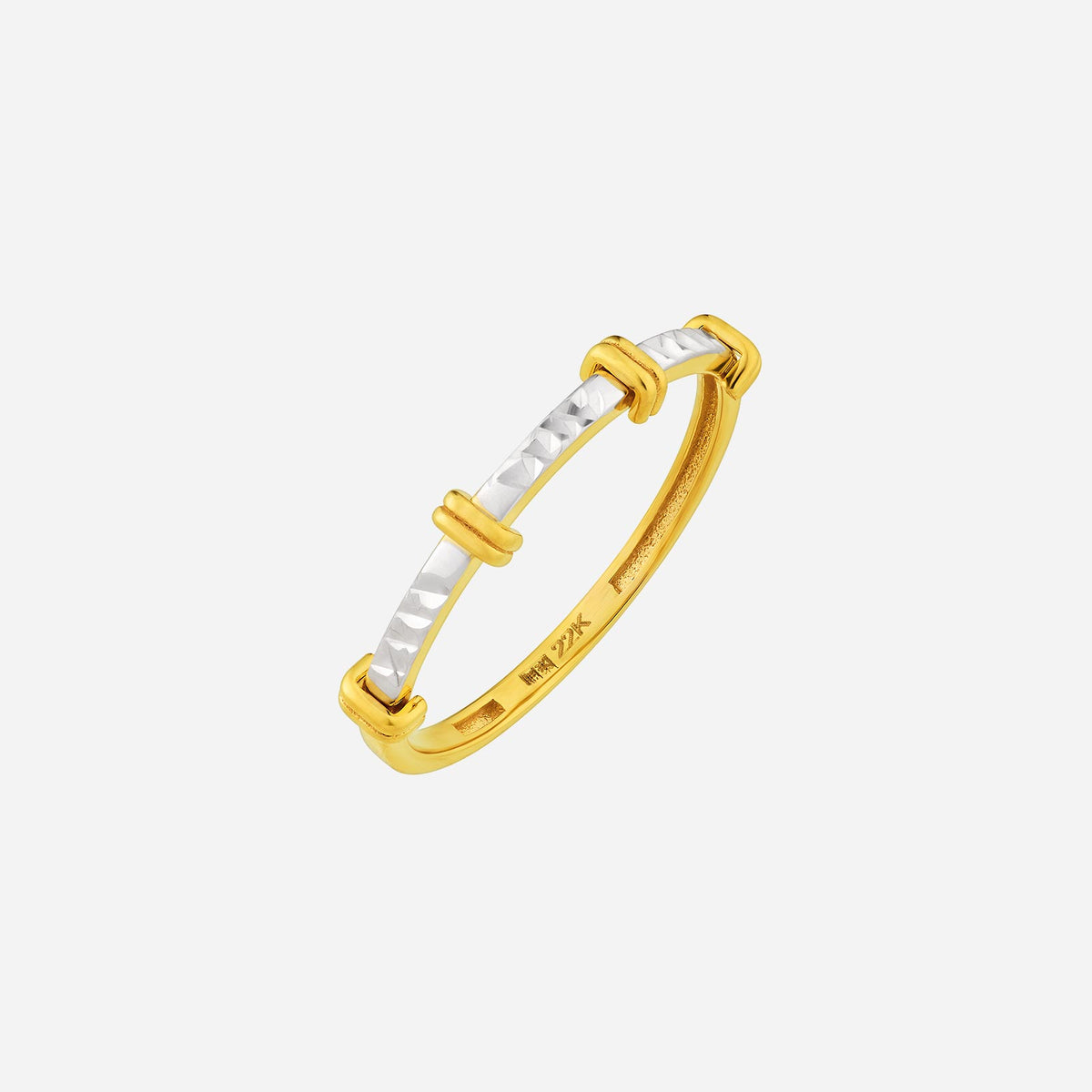 22k yellow and white gold sparkling ring with a sleek white gold center and yellow gold loop accents. modern design.