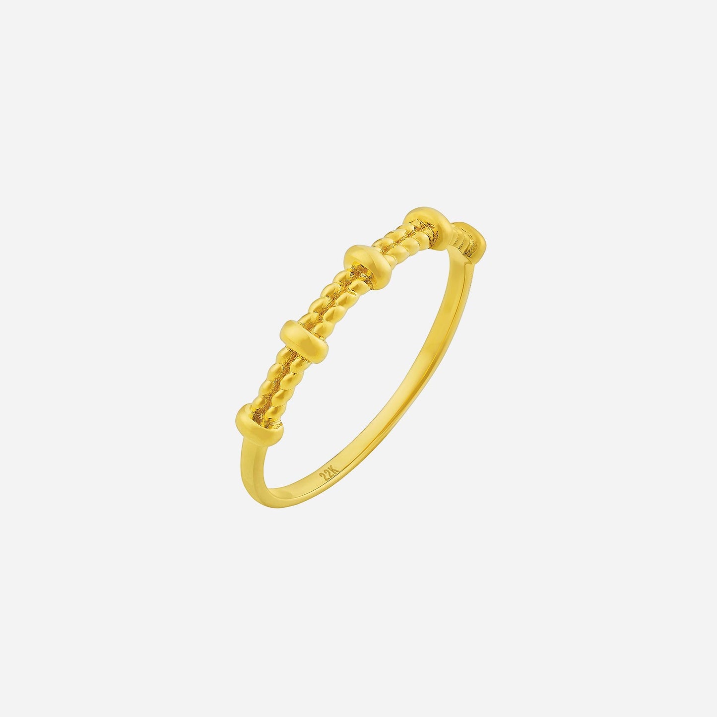 classic 22k yellow gold ring featuring a textured design with round accents for elegant sophistication.