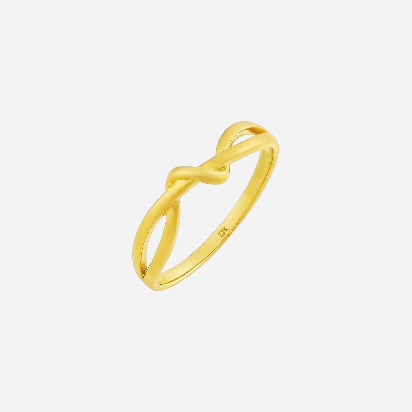 22k yellow gold knot ring with a sleek minimalist design, featuring intertwined bands for a chic look.
