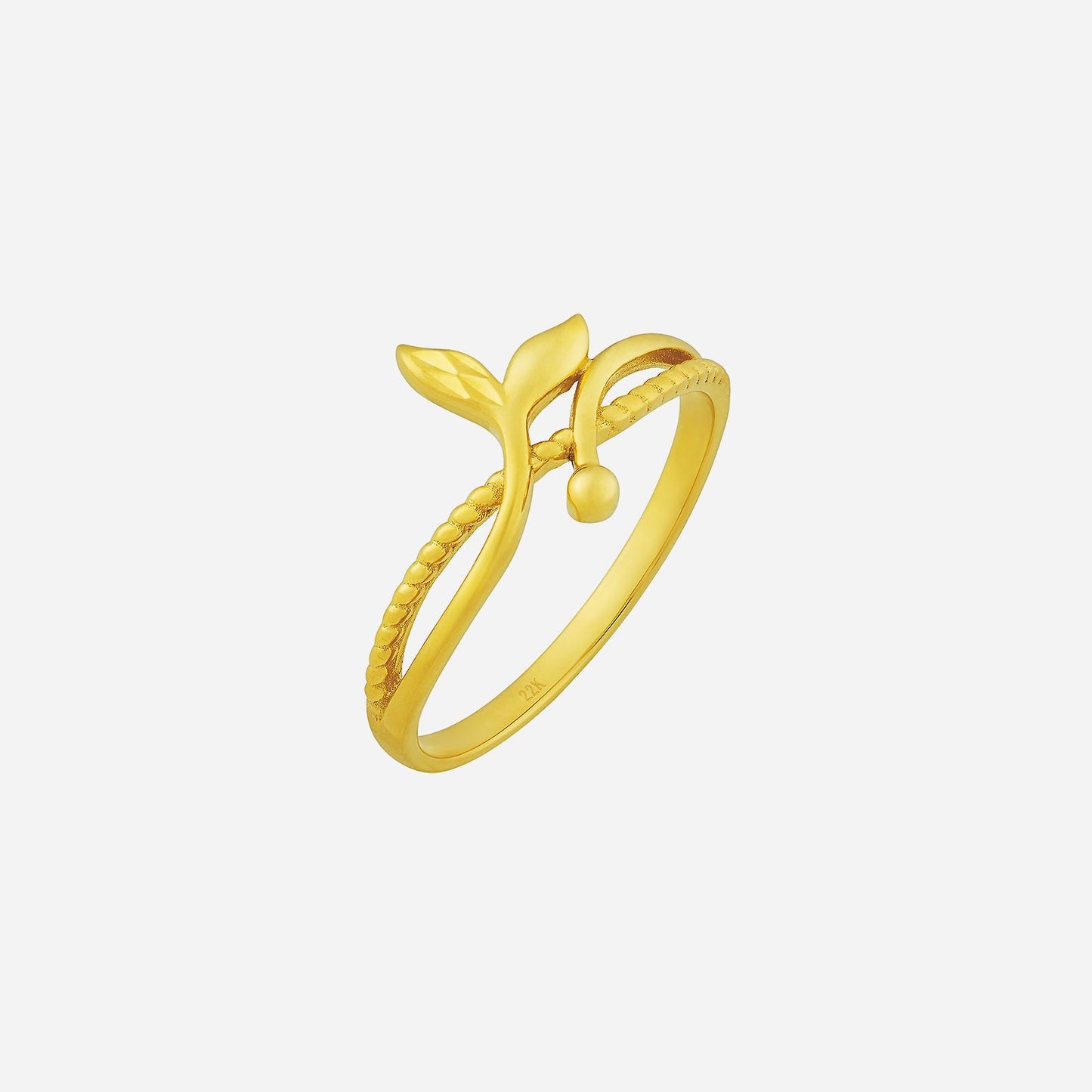 22k yellow gold ring with delicate leaf design and charming dangling detail, showcasing elegant craftsmanship.