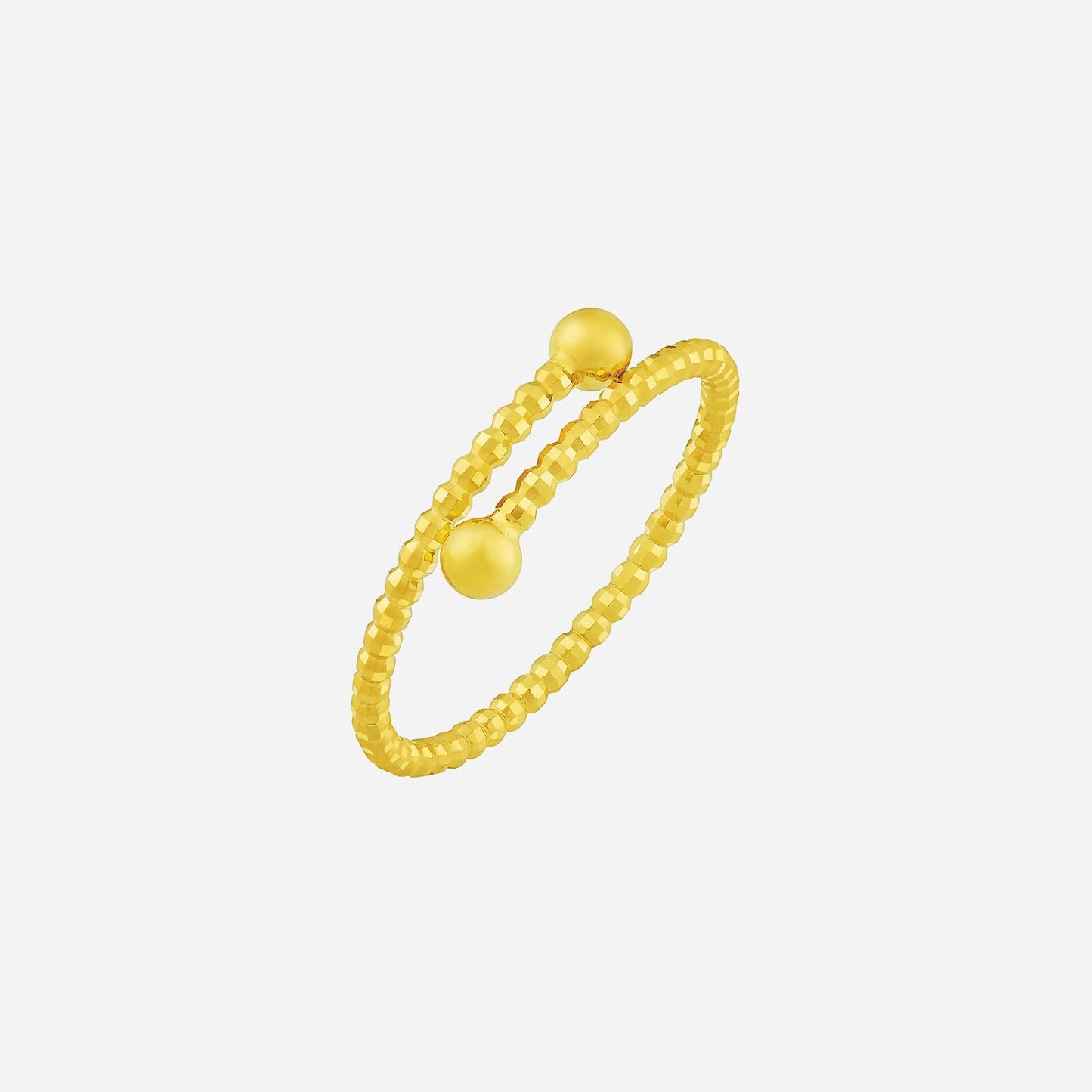 22k yellow gold ring with beaded texture and playful open-ended design for a modern, stylish look.