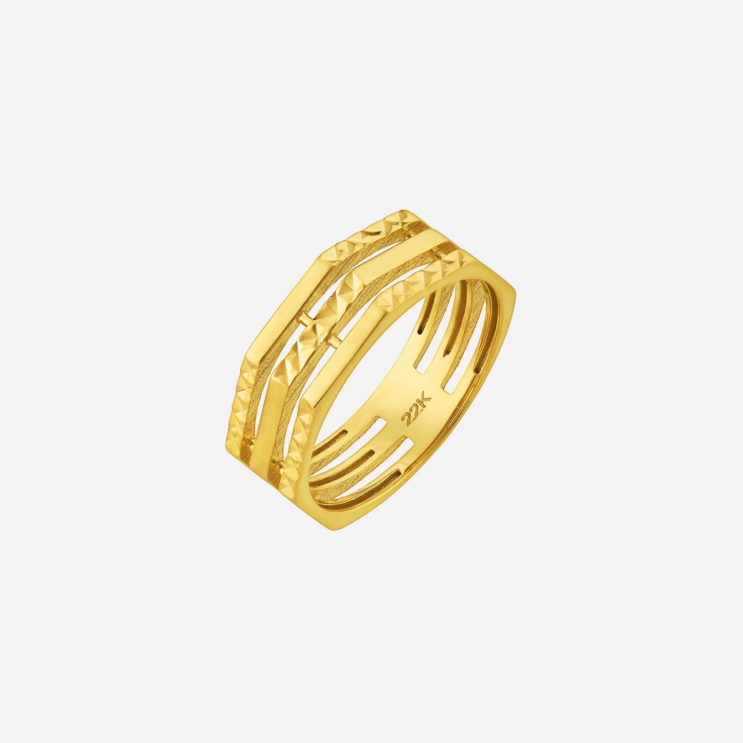 sparkling 22k yellow gold ring featuring three textured bands in a bold, modern design.