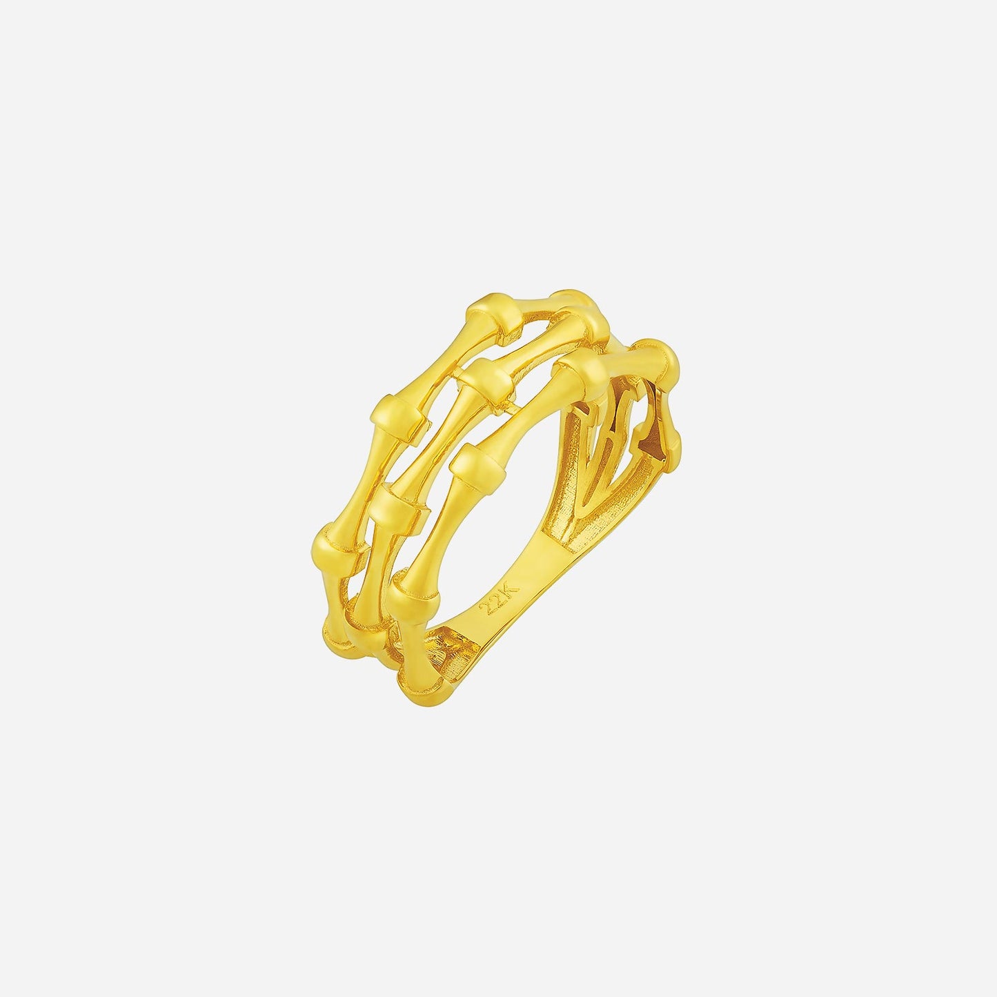 22k yellow gold ring with an intricate textured design and layered bands for a bold, elegant look.