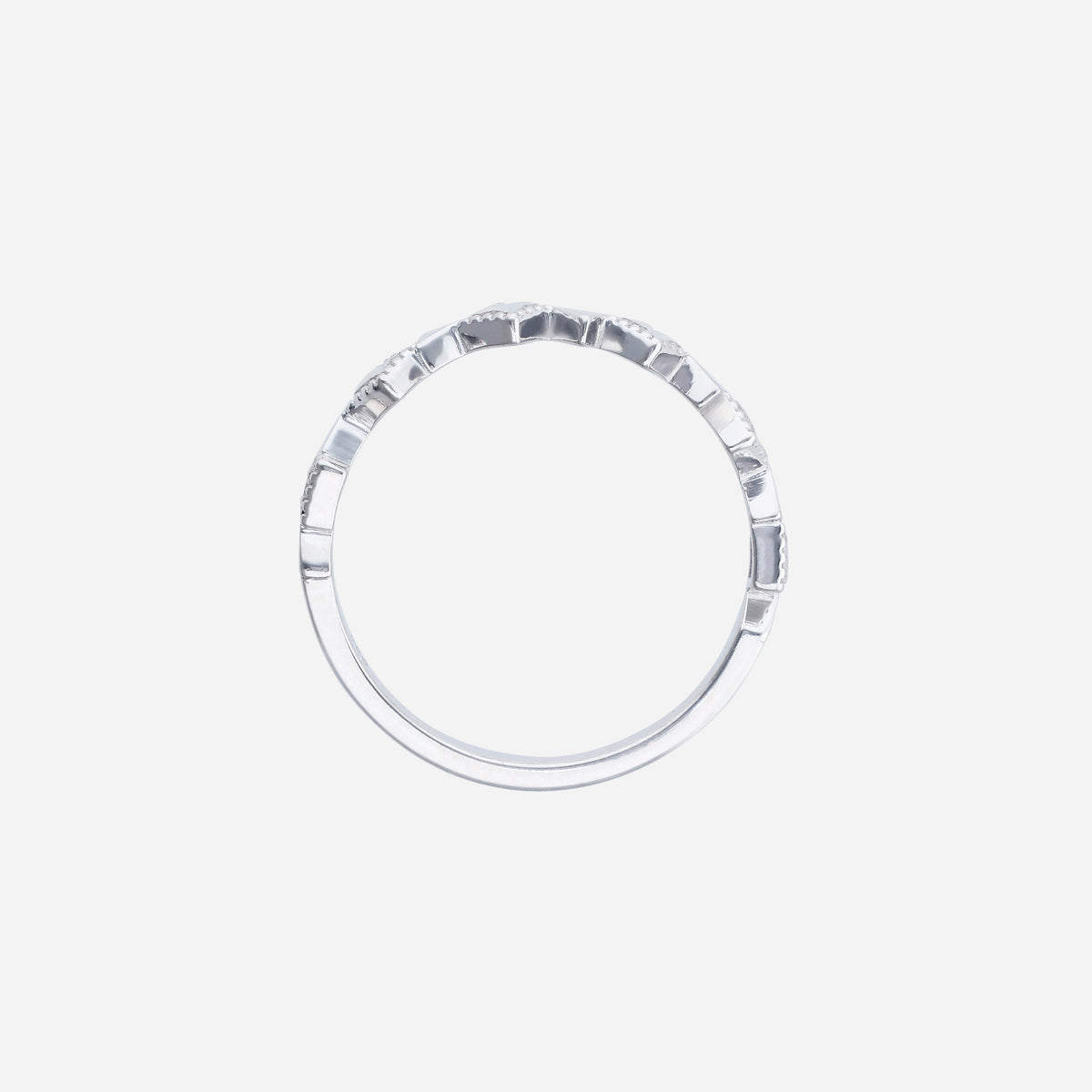 geometric ring in 18k white gold with angular diamond-shaped accents for contemporary elegance.