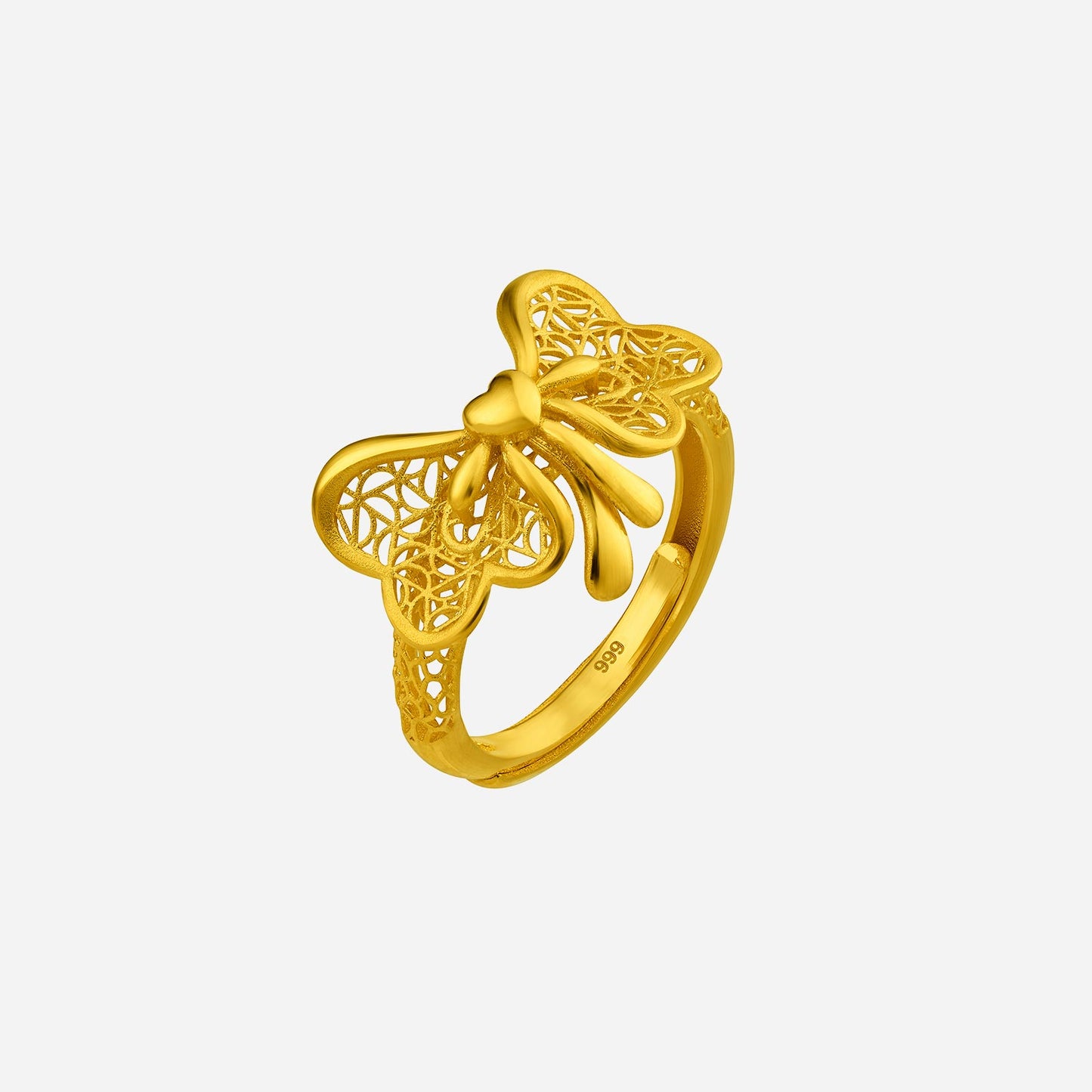 elegant ribbon ring in 24k yellow gold with intricate filigree design and playful bow detail. perfect for stylish accents.