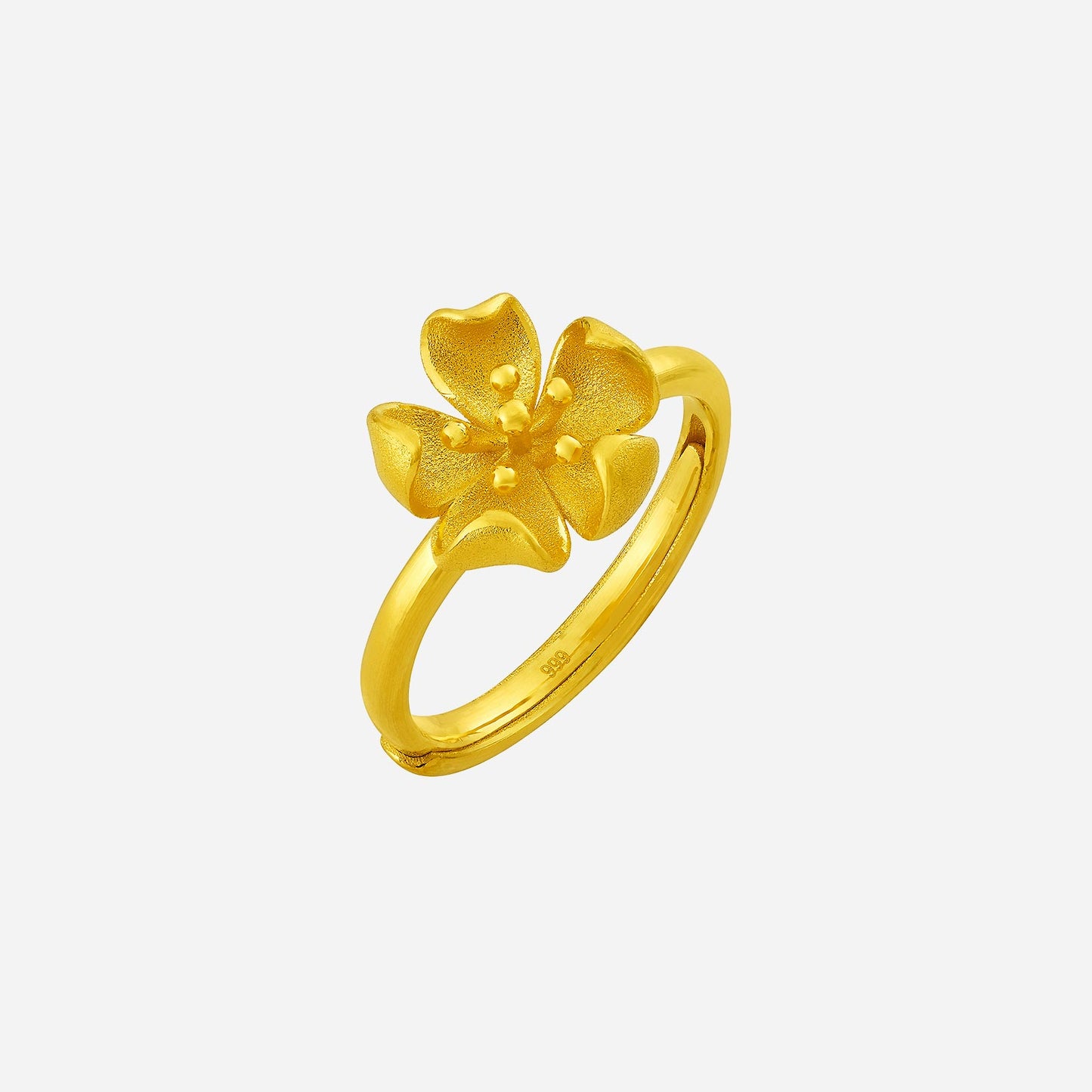 nemophila ring in 24k yellow gold, featuring a delicate flower design with textured petals and a polished band.