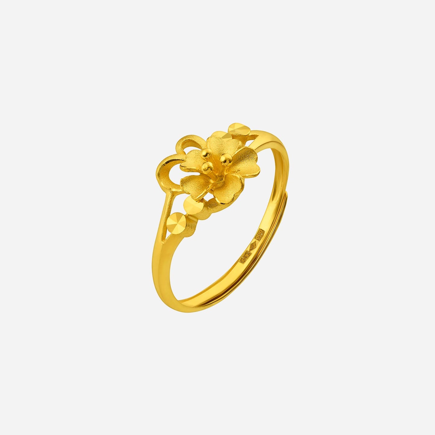 flower ring in 24k yellow gold featuring delicate floral design with textured petals and polished accents.
