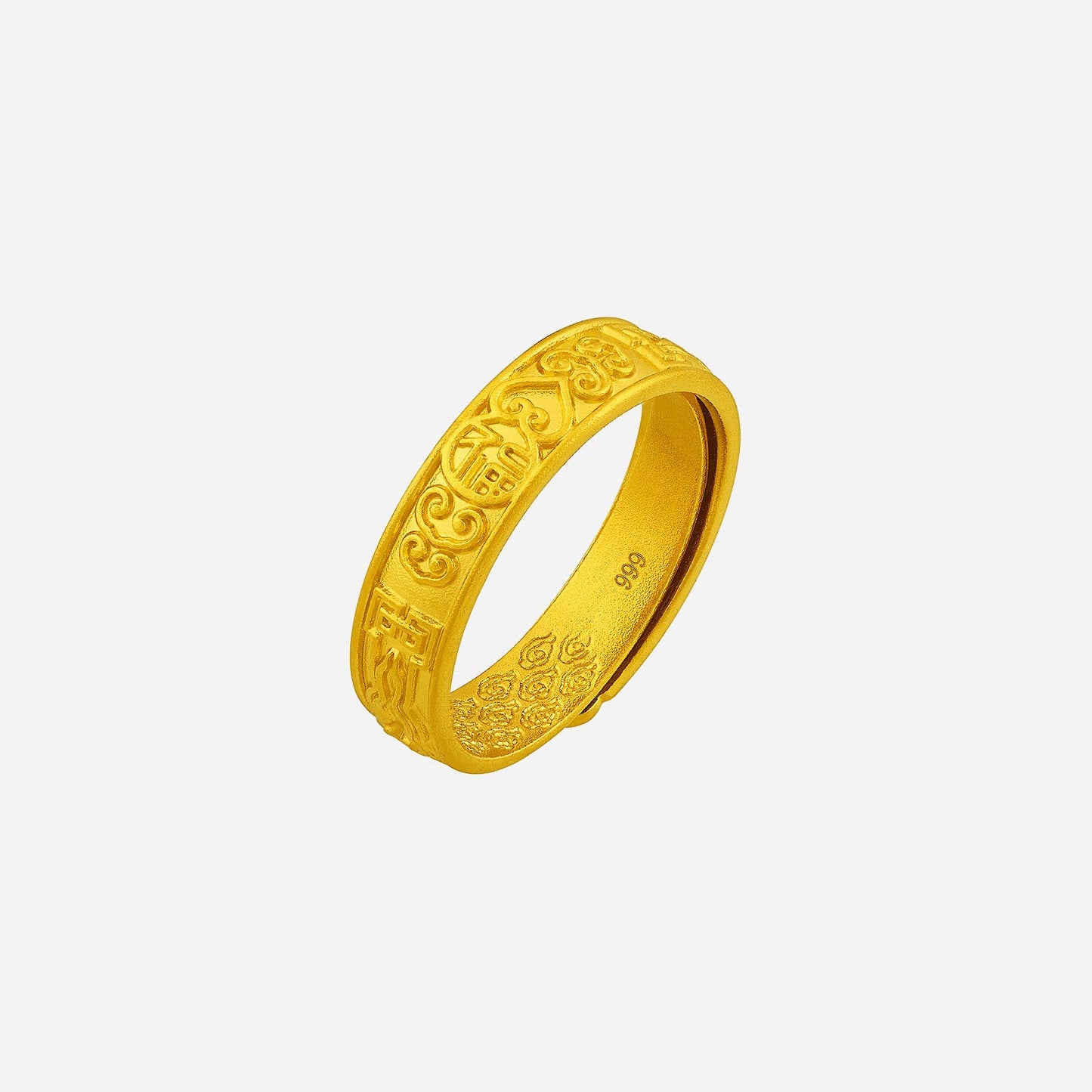 24k yellow gold ring with intricate carved motifs, symbolizing tradition and elegance. perfect for special moments.