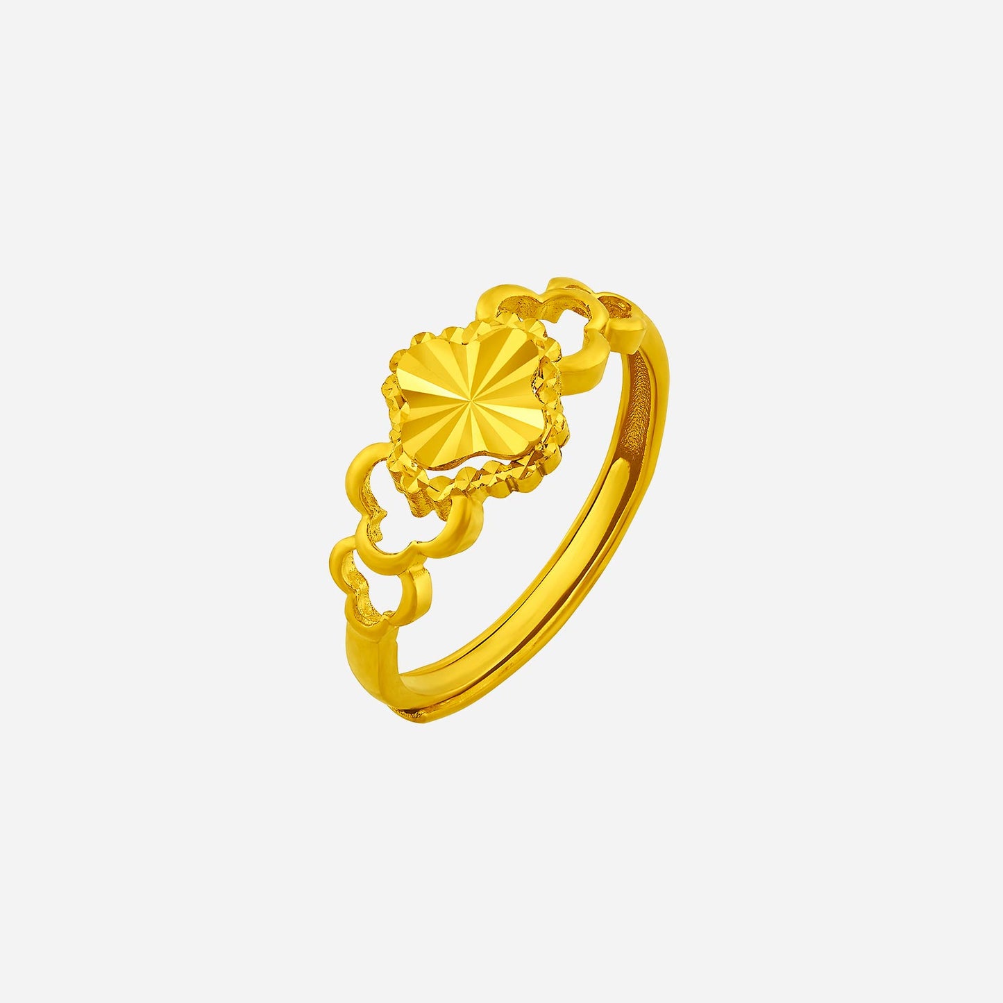 sunburst bloom ring in 24k yellow gold with faceted starburst centre and ornate motifs, embodying a radiant design.
