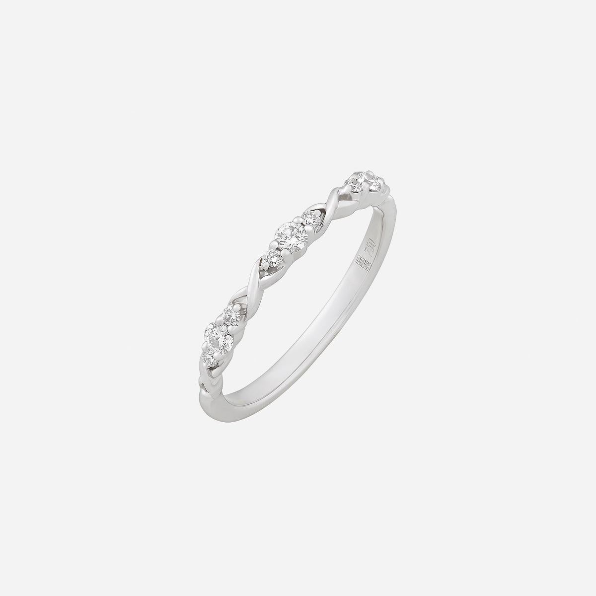 delicate twist white gold ring featuring sparkling diamonds in an elegant swirling design. perfect for any occasion.