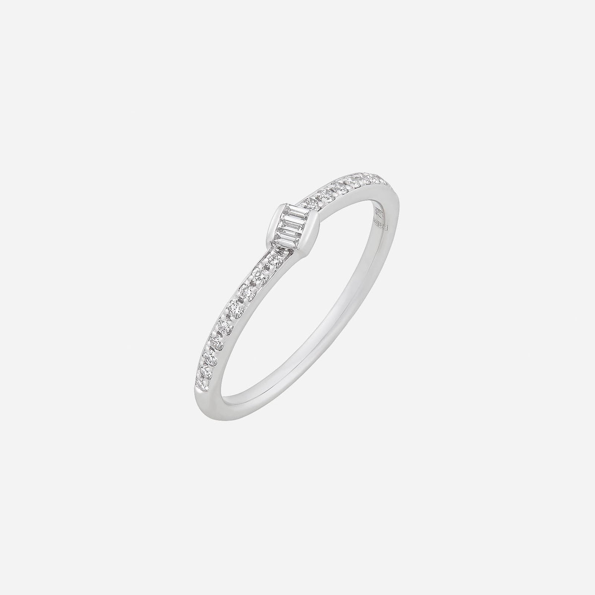 dainty diamond ring in 18k white gold with minimalist design and brilliant diamonds. timeless elegance for any occasion.