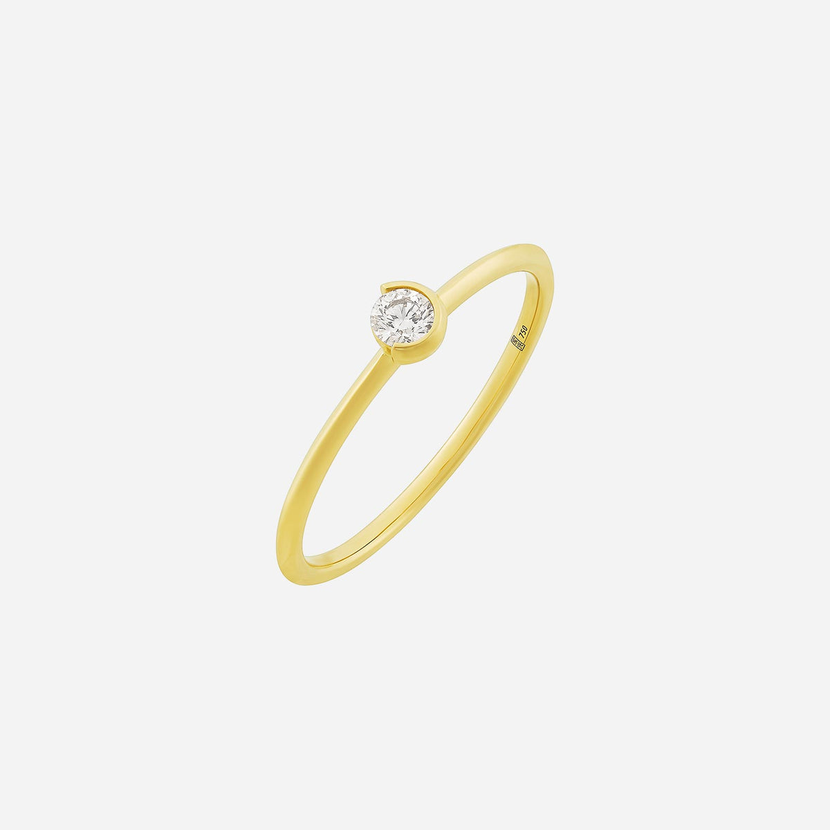 light embrace round diamond ring in 18k yellow gold with a single sparkling diamond held in a minimalist setting.