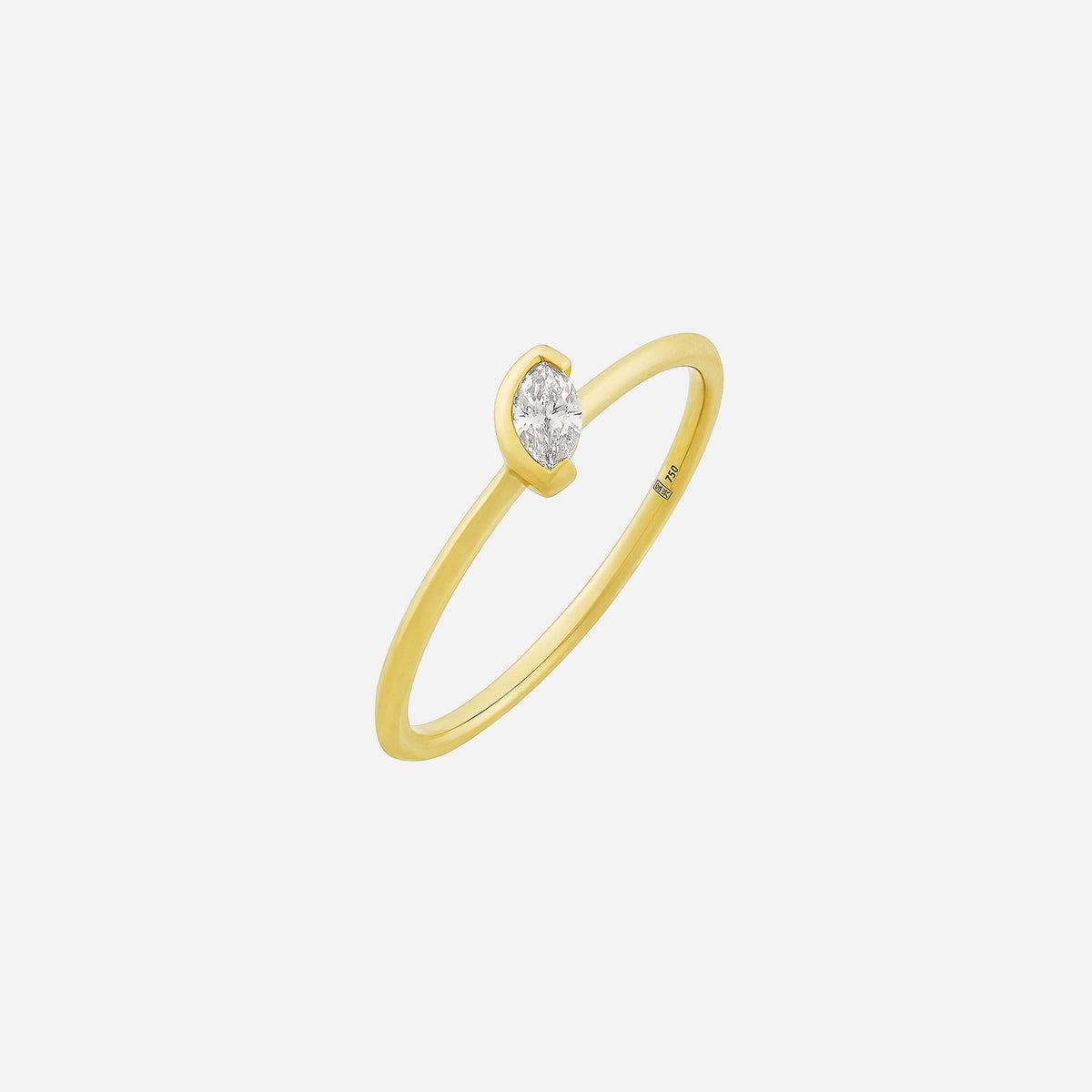 marquise diamond ring in 18k yellow gold with a slim band and tilted diamond setting. ideal for elegant occasions.