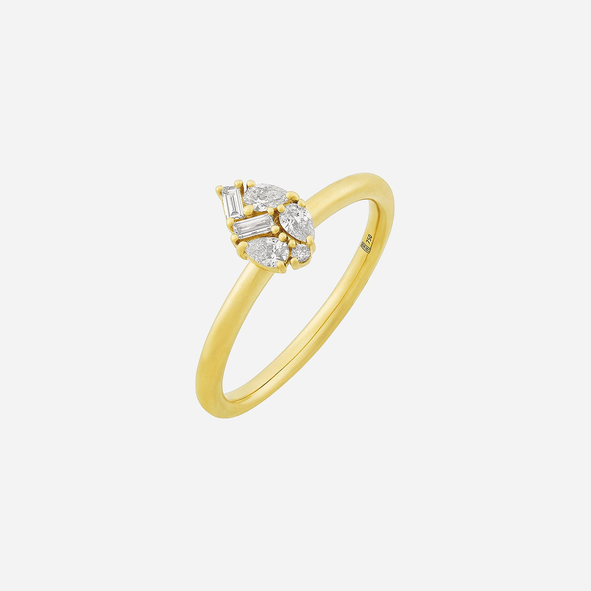 moonlit dew diamond ring in 18k yellow gold featuring teardrop and baguette diamonds in a delicate design.