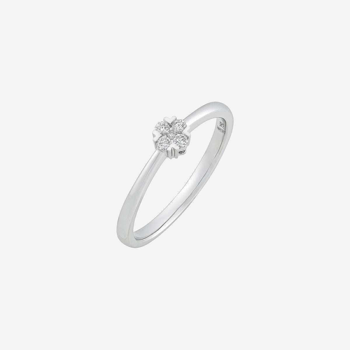 petite sparkle blossom diamond ring in 18k white gold with floral cluster design and shimmering diamonds.