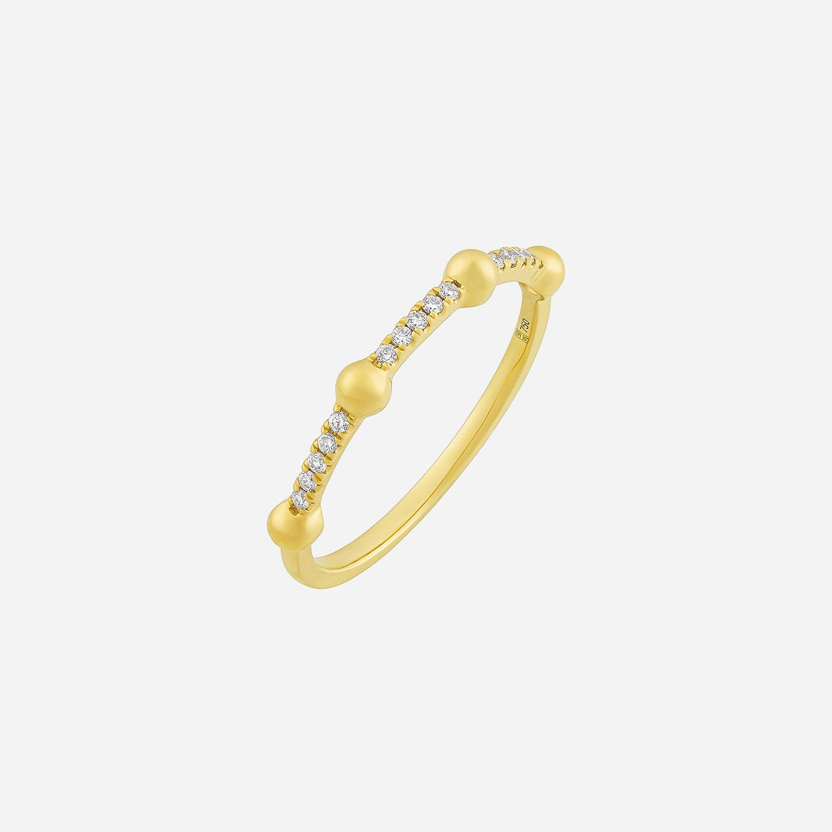 line of light diamond ring in 18k yellow gold, featuring pavé diamonds in a modern dotted design. perfect for stacking.