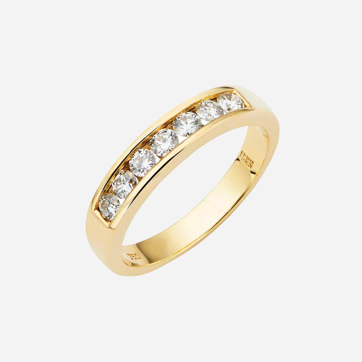 yellow gold diamond band featuring channel set round diamonds in a sleek, modern design.