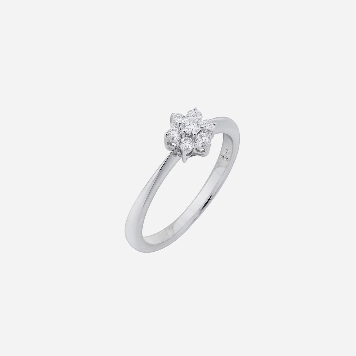 blossom diamond ring in 18k white gold featuring a floral design with sparkling diamonds at the center.