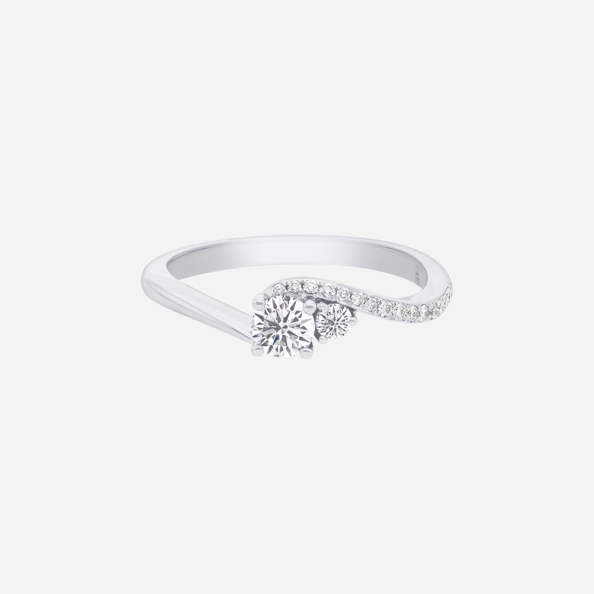 eternal sparkle diamond ring in 18k white gold with a central diamond and pavé-set diamonds along a flowing band.