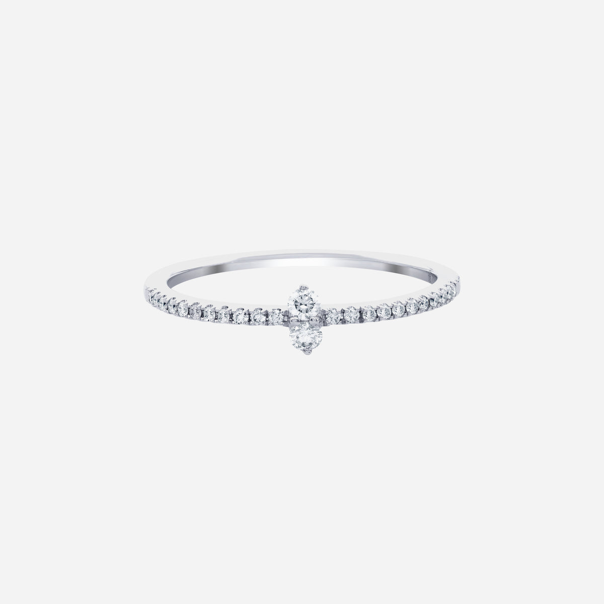 radiance duo diamond ring in 18k white gold with round diamonds on a slim pavé band, showcasing elegant simplicity.