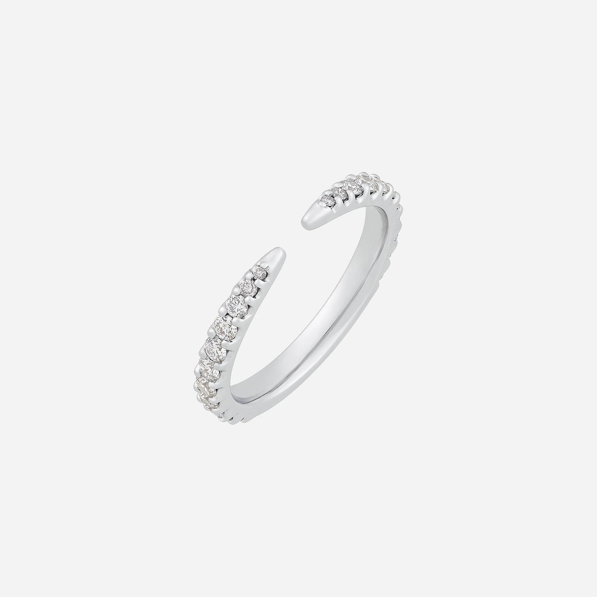 eternal gleam open shank ring in 18k white gold, featuring a claw set of brilliant diamonds along the band.