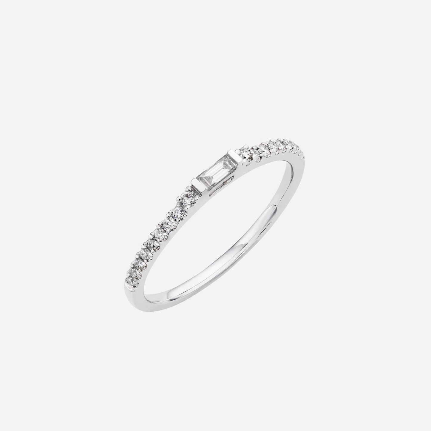baguette diamond ring in 18k white gold, adorned with round diamonds for a delicate and elegant design.