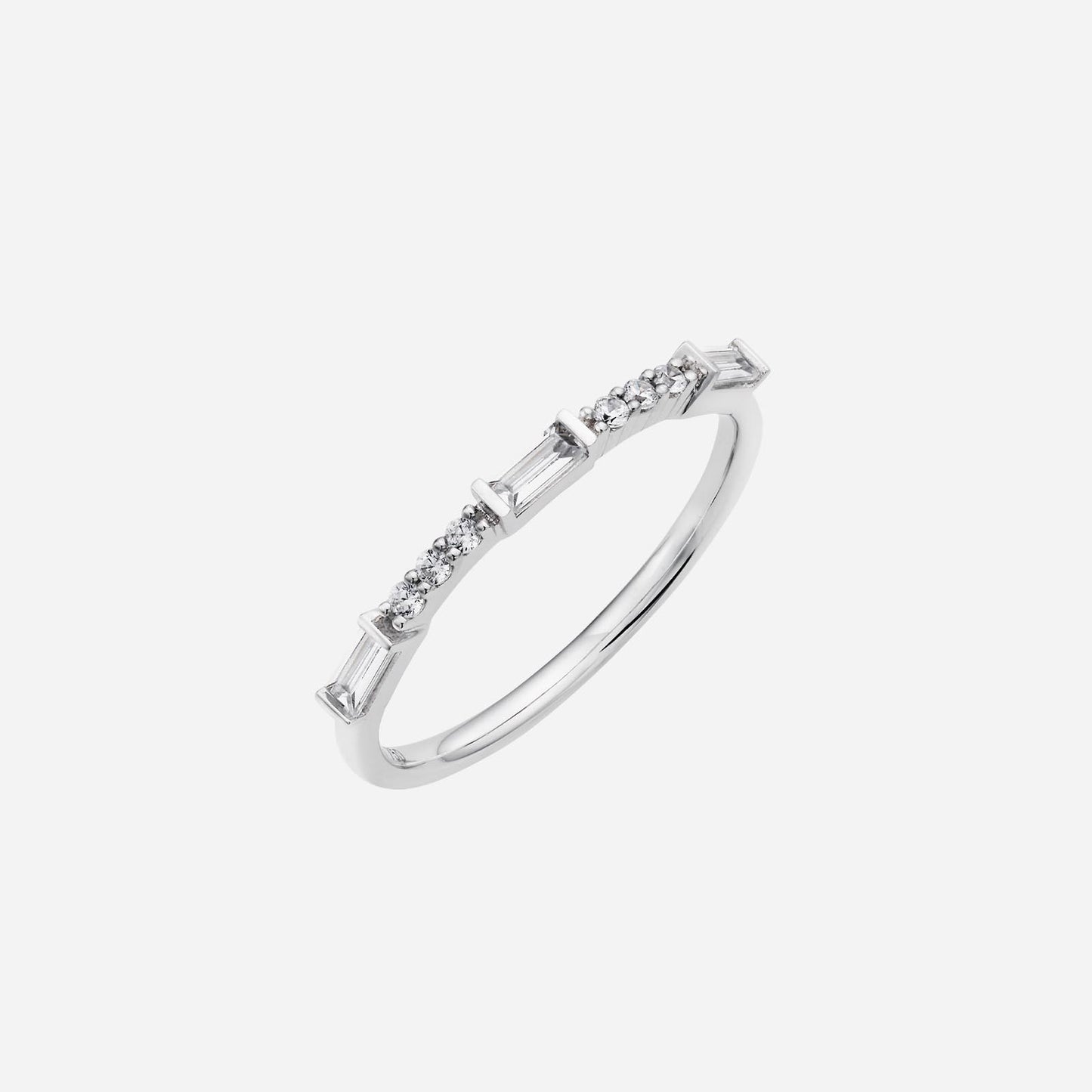 baguette diamond ring in 18k white gold with alternating round diamonds for a classic and elegant design.