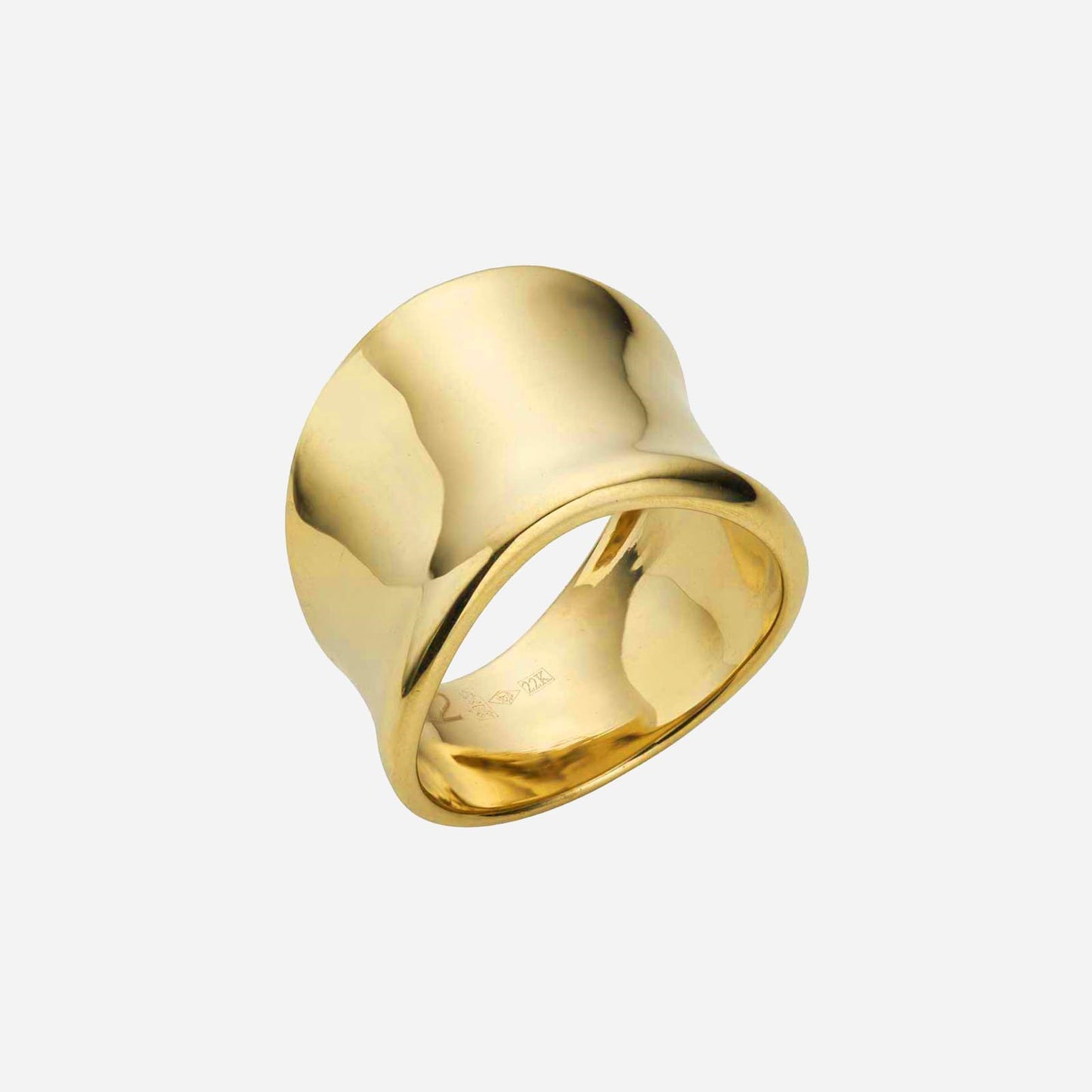 concave ring in polished 22k yellow gold with a smooth, flowing design. ideal for elegant styling.