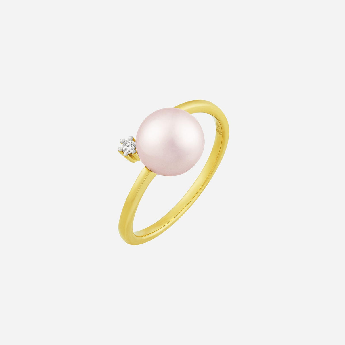 freshwater pearl ring in 18k yellow gold with a delicate diamond accent for an elegant look.