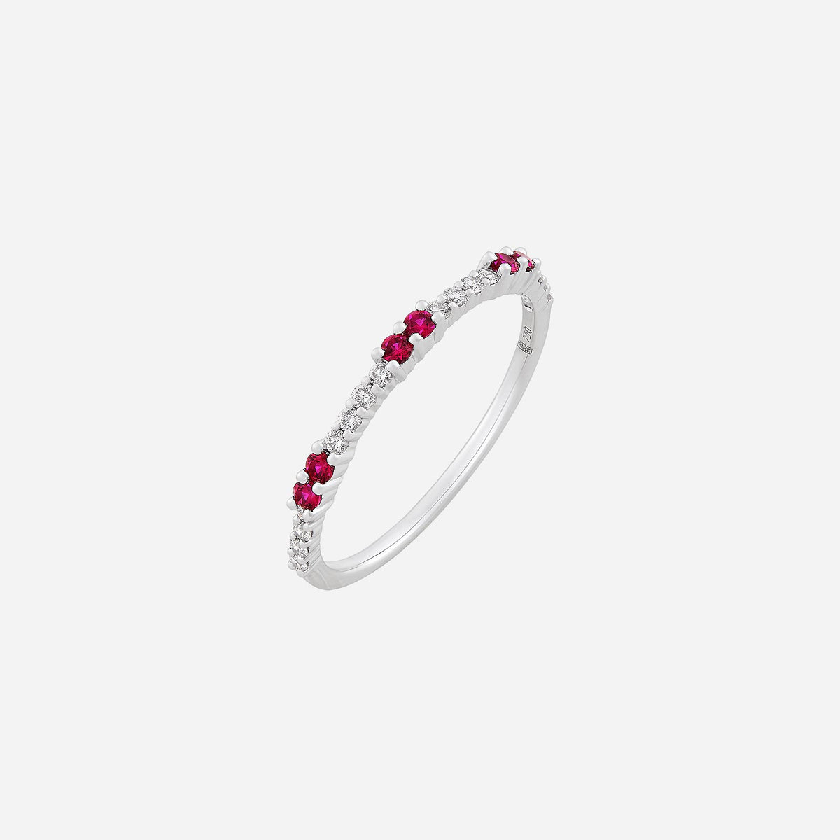 ruby and diamond ring in 18k white gold, showcasing alternating vivid rubies and shimmering diamonds in elegant design.