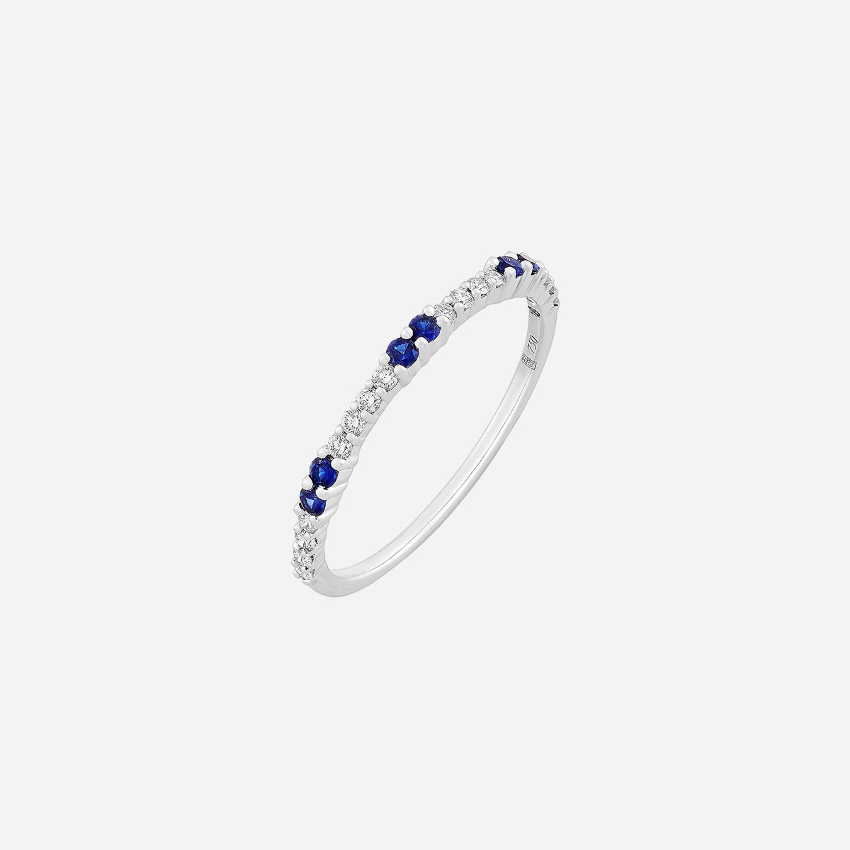 blue sapphire and diamond ring in 18k white gold, featuring alternating gemstones in an elegant design.
