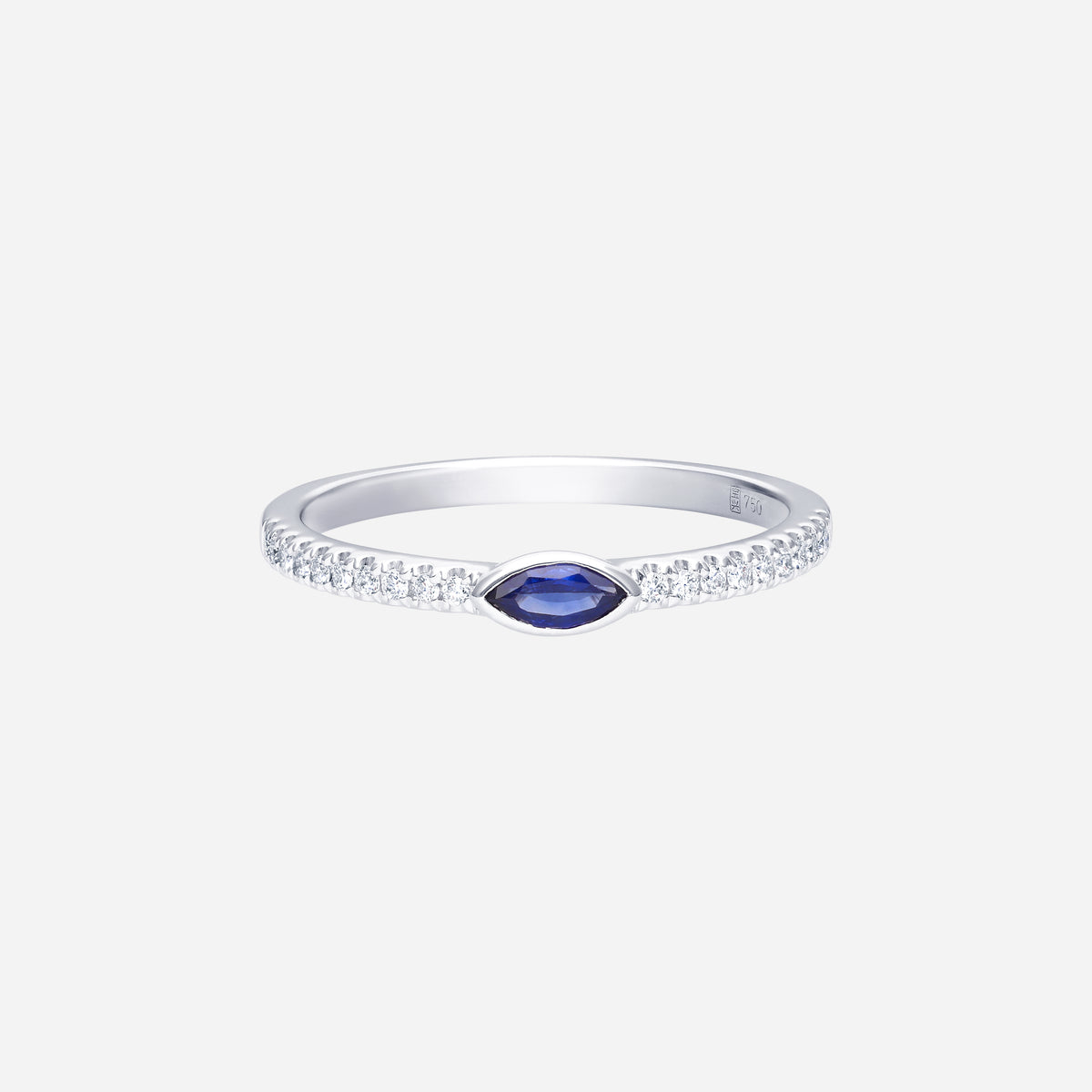 blue sapphire marquise ring in 18k white gold, adorned with sparkling diamond accents on a sleek band.
