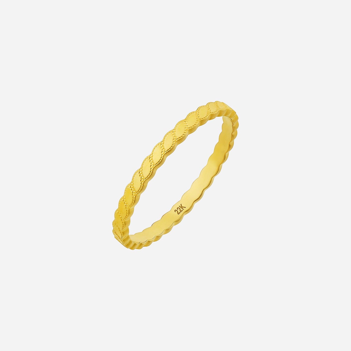 22k yellow gold ring with an intricate textured finish, featuring a delicate braided design for elegant stacking.