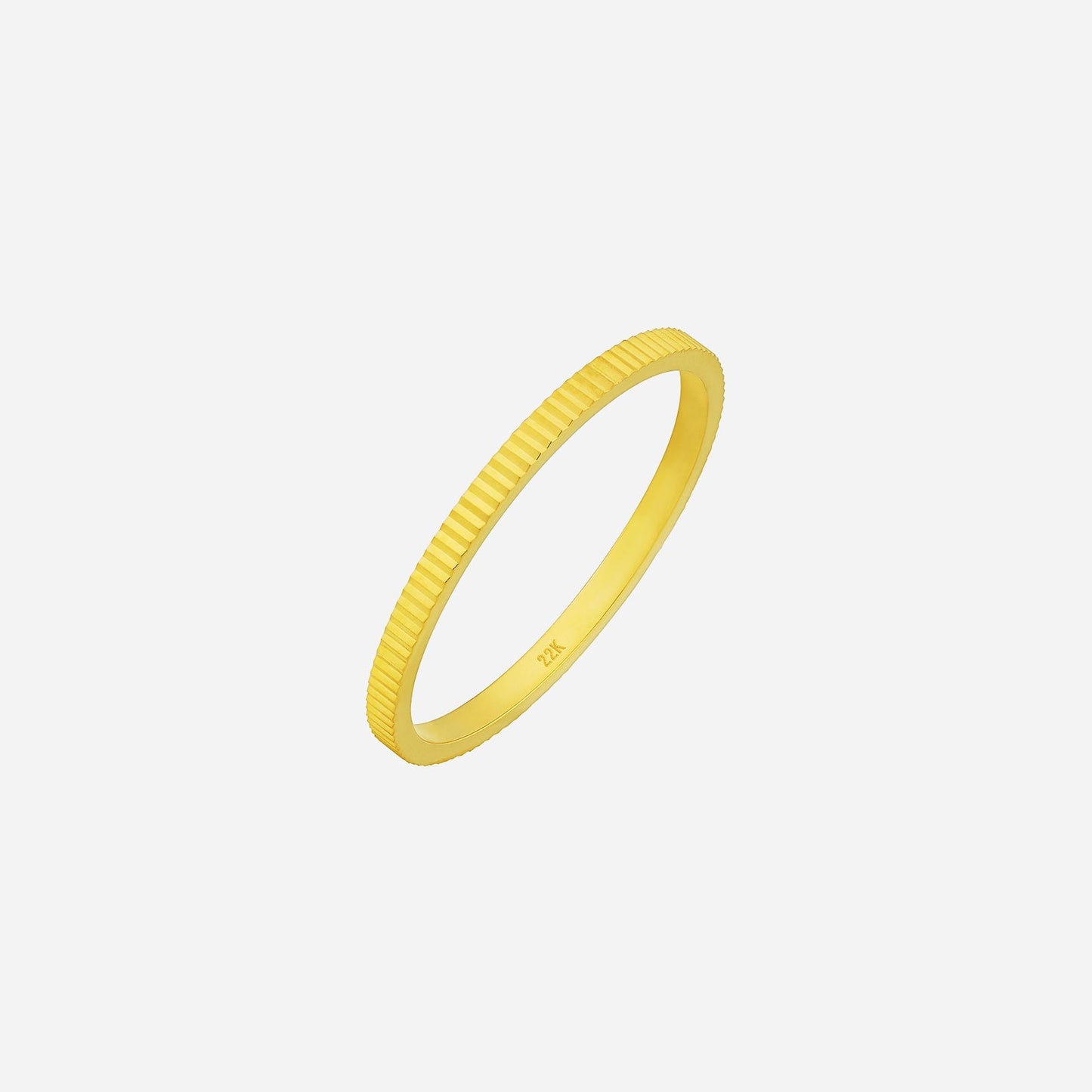 minimalist 22k yellow gold textured band ring, perfect for stacking or wearing solo, highlighting elegant simplicity.