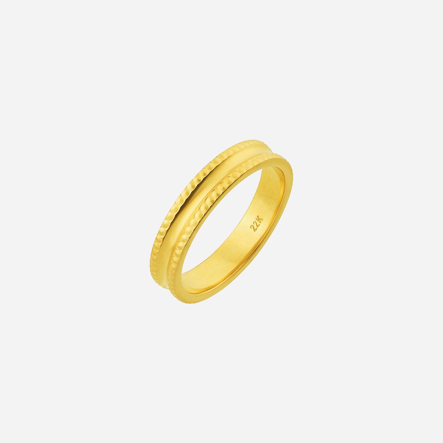 22k yellow gold adore band featuring textured sides and a smooth interior for a modern, elegant look.