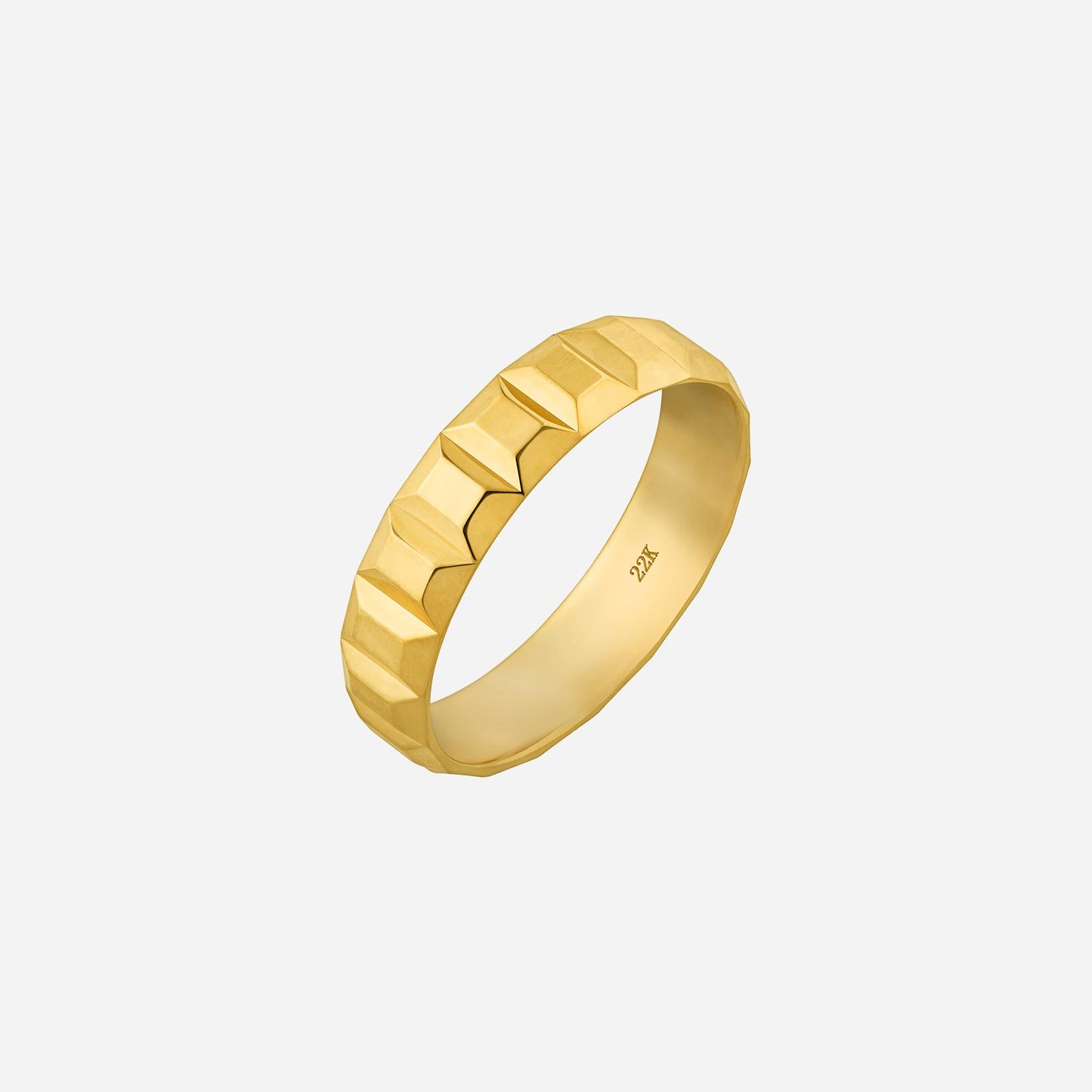 22k yellow gold geometric band ring with a distinctive faceted design, showcasing contemporary elegance.