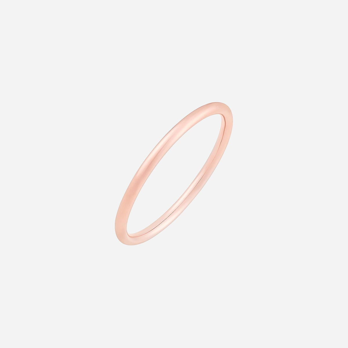18k rose gold band with a sleek, minimalist design for timeless elegance. perfect for stacking or solo wear.