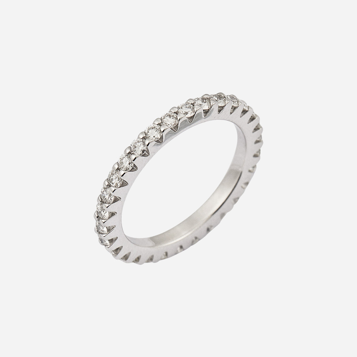 adore wedding band in 18k white gold featuring a row of sparkling diamonds with a scalloped edge design.