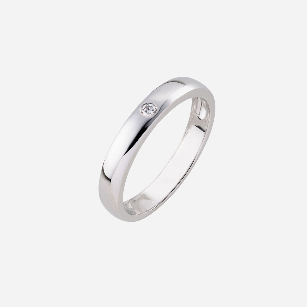 18k white gold adore wedding ring featuring a single diamond in a sleek, polished band design.