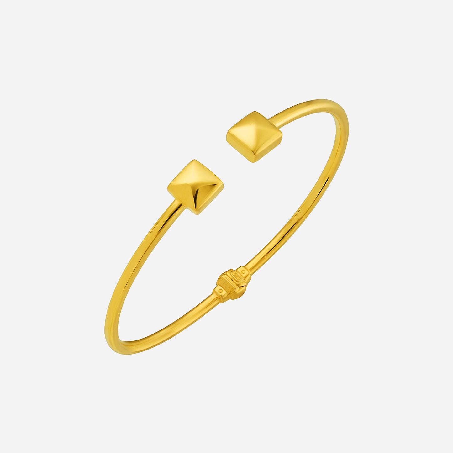duo cube bangle in lustrous 22k yellow gold with open design and pyramid-shaped accents. elegant and modern jewellery piece.