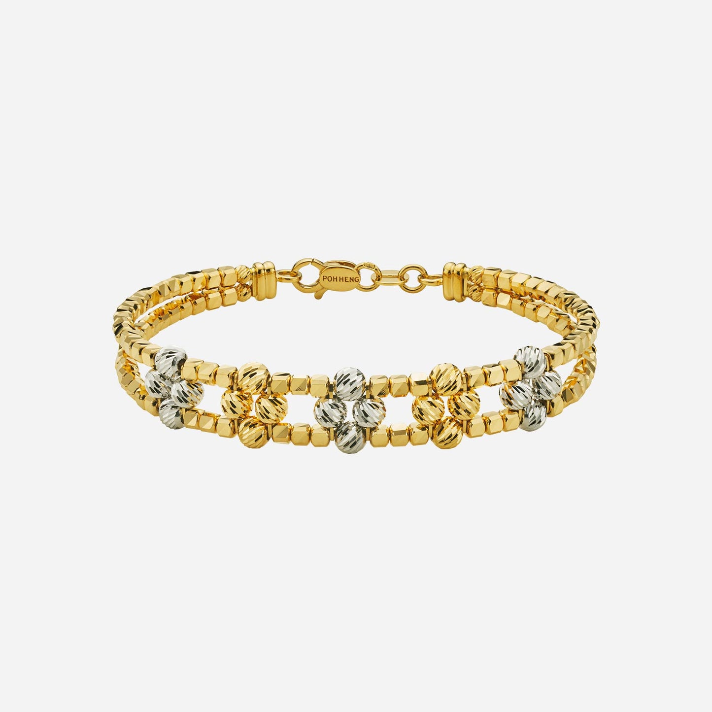 classic bead bangle in yellow and white gold with alternating clover designs, crafted from 22k gold.