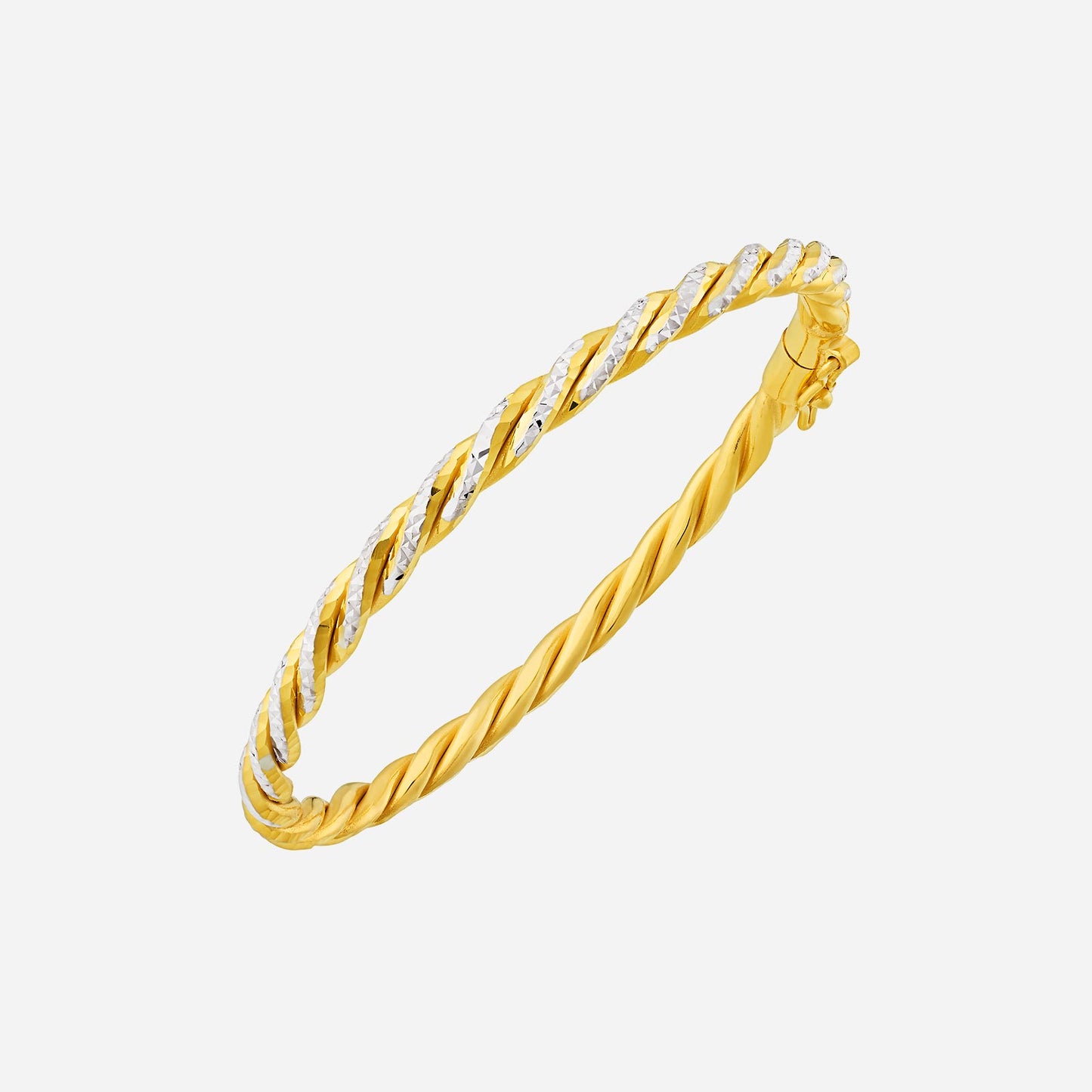 twisted bangle in 22k yellow and white gold with a playful rope chain design. elegant and sophisticated wristwear.