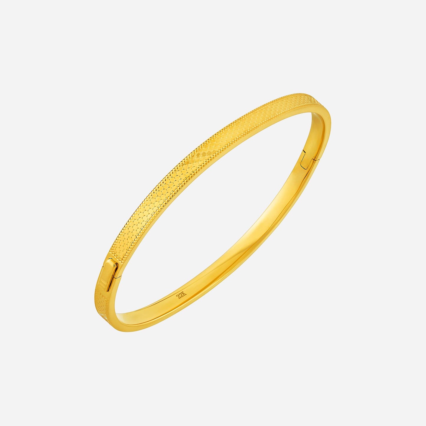 scales bangle in 22k yellow gold featuring a textured scale design, perfect for layering or wearing alone.