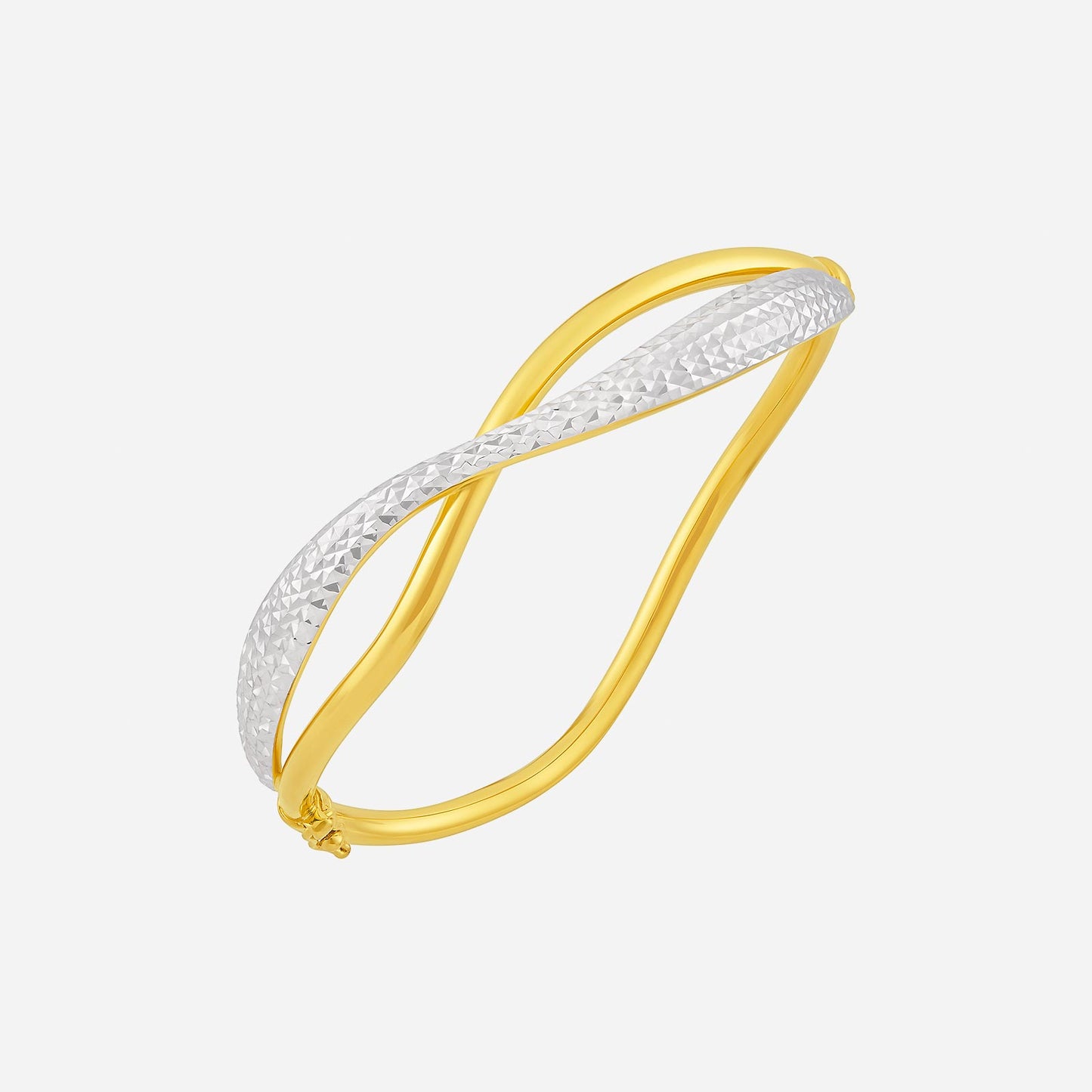 twisted bangle in 22k yellow and white gold with a textured finish, showcasing a luxurious and elegant design.