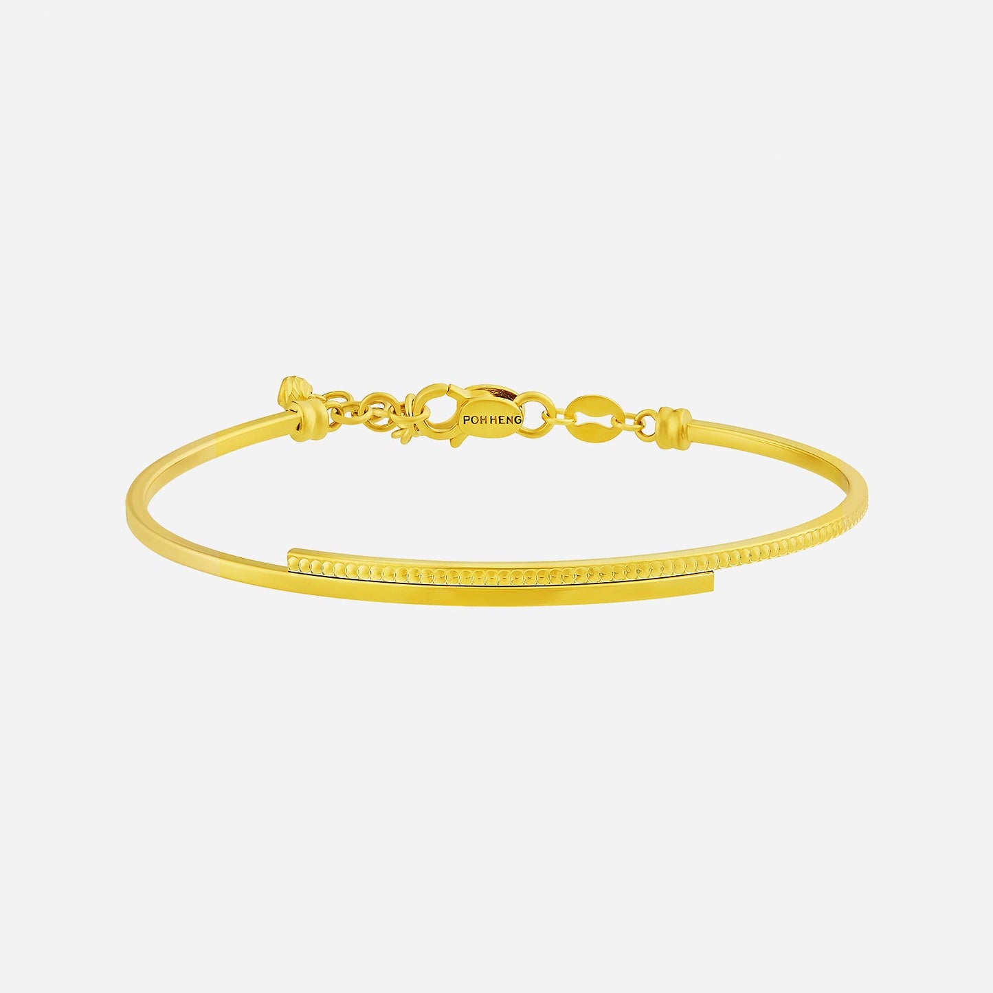 radiant bangle in 22k yellow gold with sleek design and subtle textured detailing for everyday elegance.