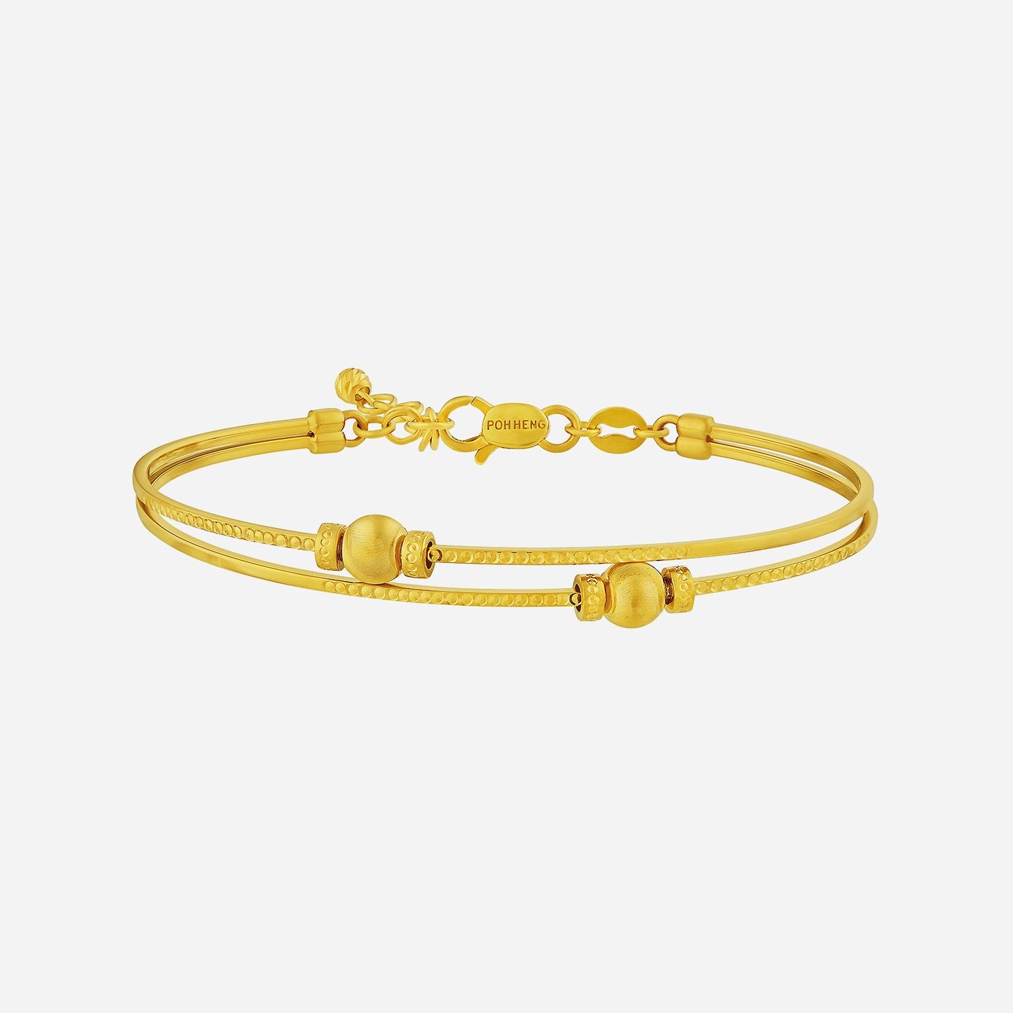 beaded dual bangle in 22k yellow gold with polished beads and textured bands for refined elegance.