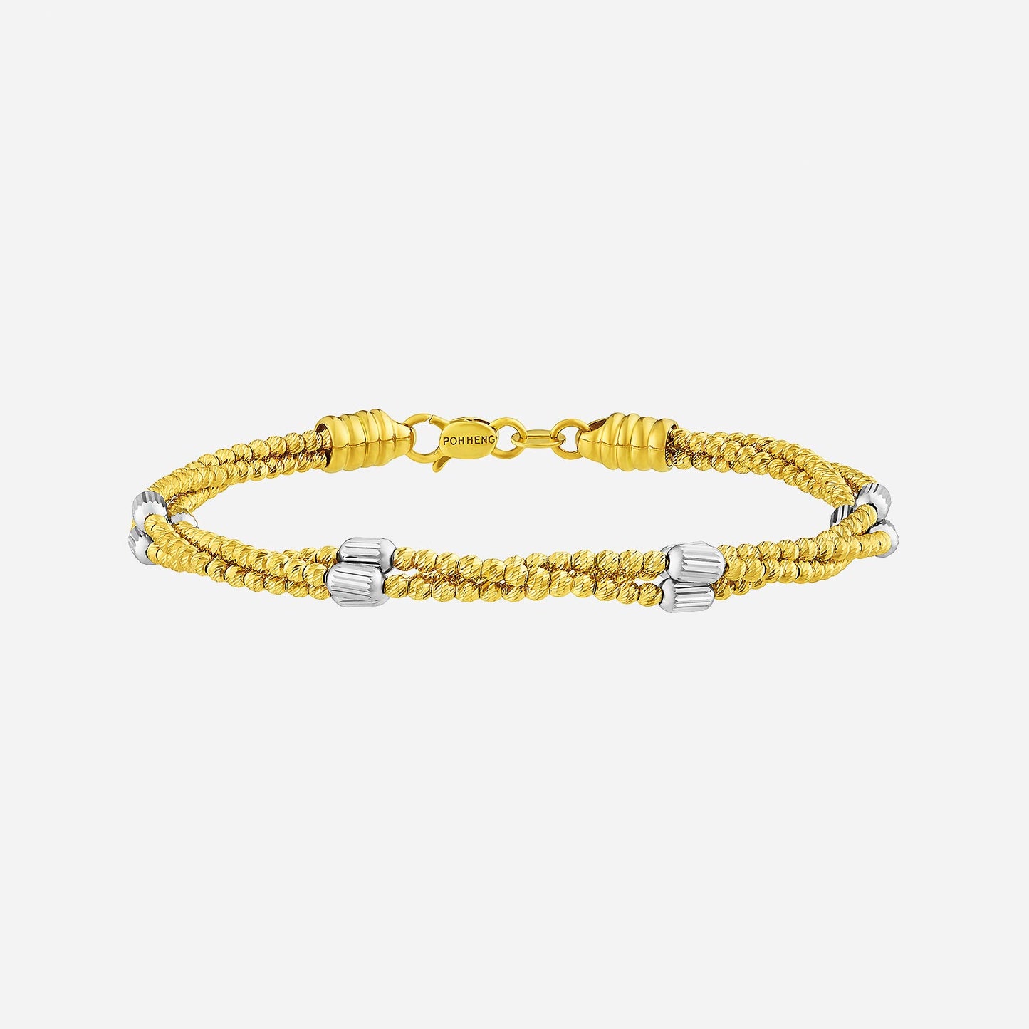 braided 22k yellow and white gold bangle with sculptural texture and modern design elements.