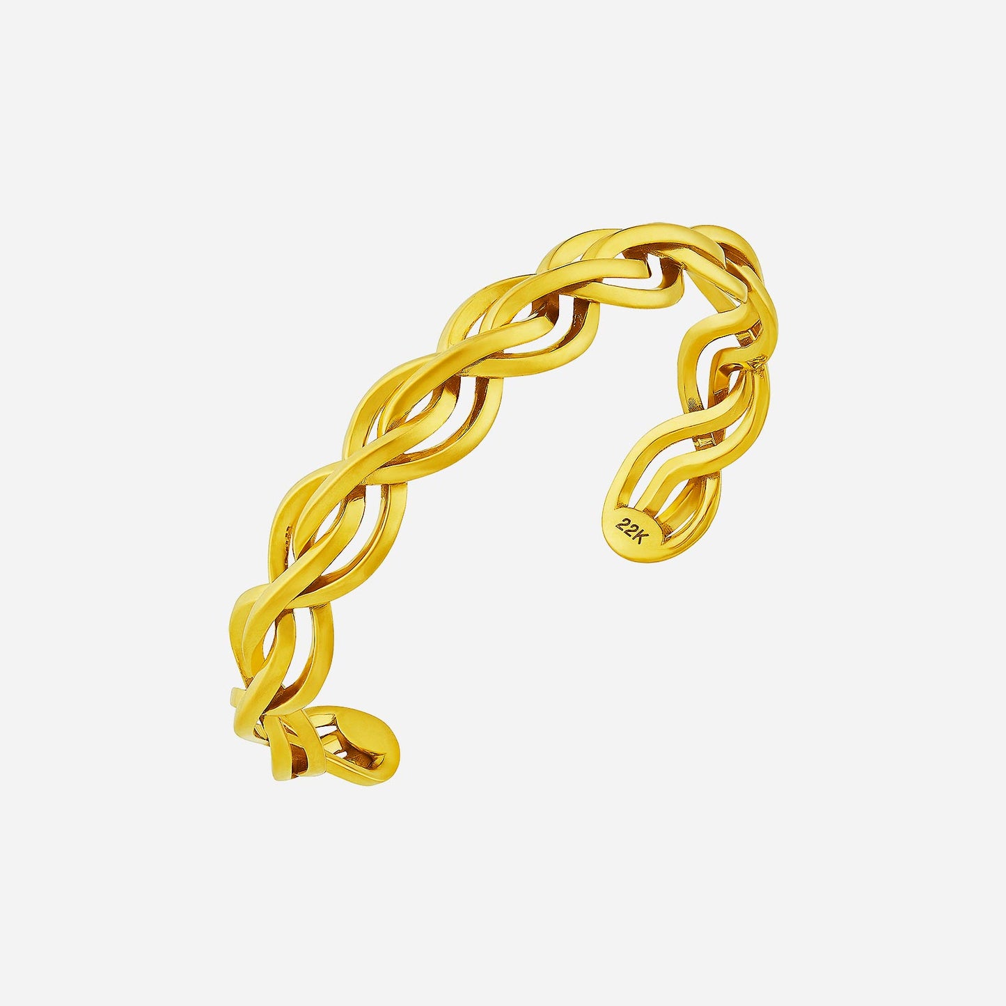interlace bangle in 22k yellow gold with sculptural, intertwined design for a fluid and confident style.